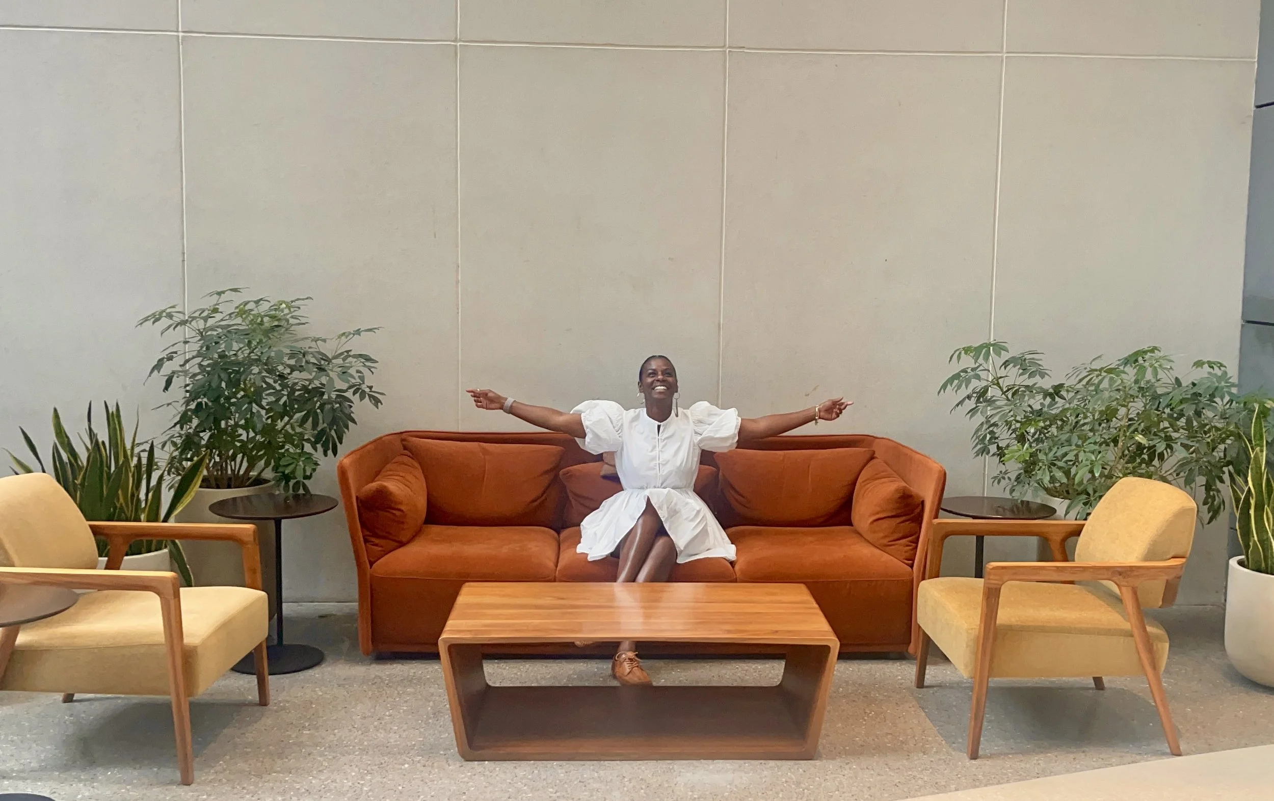 MHR Joy on an orange couch.jpg