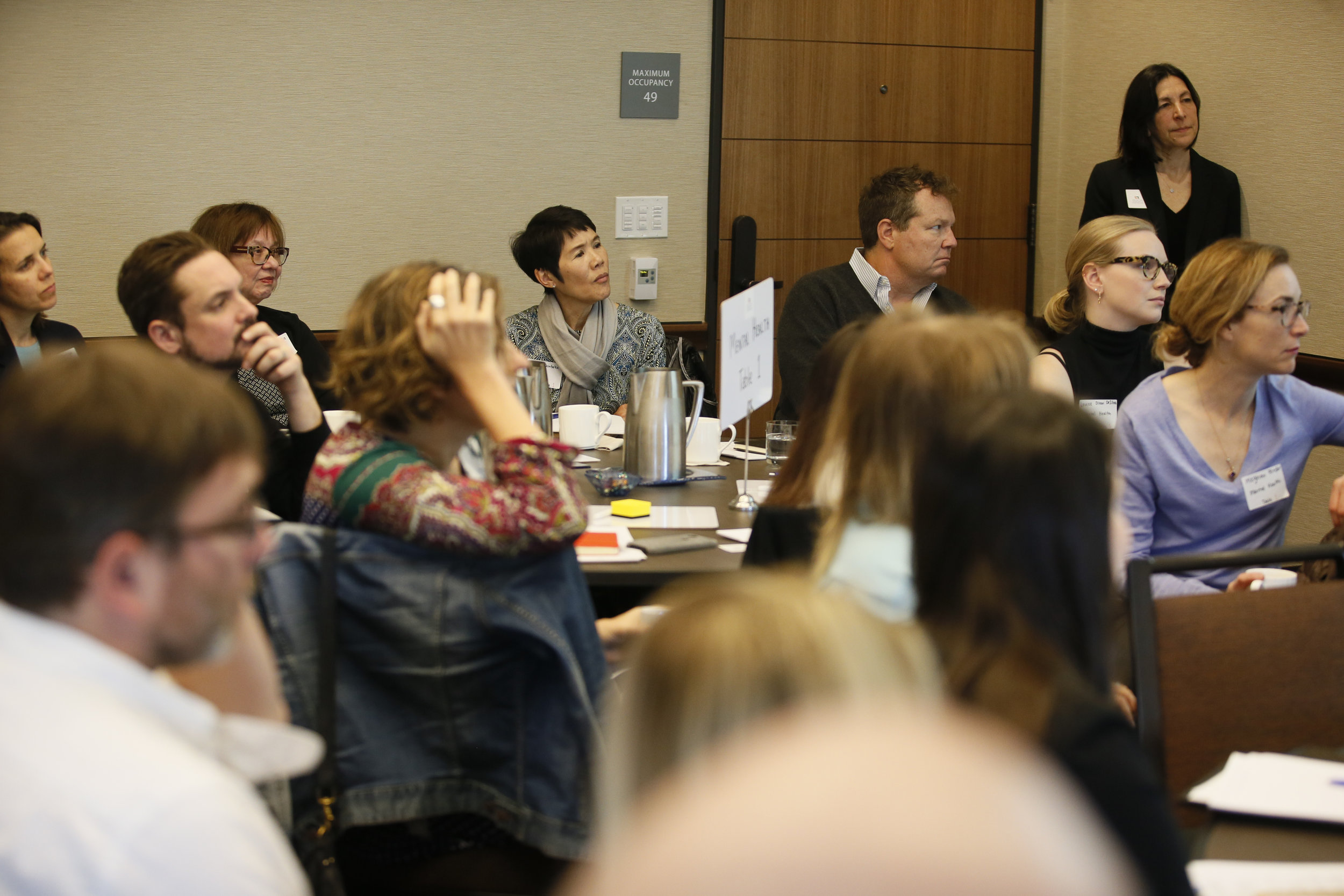 Participants listening to speakers