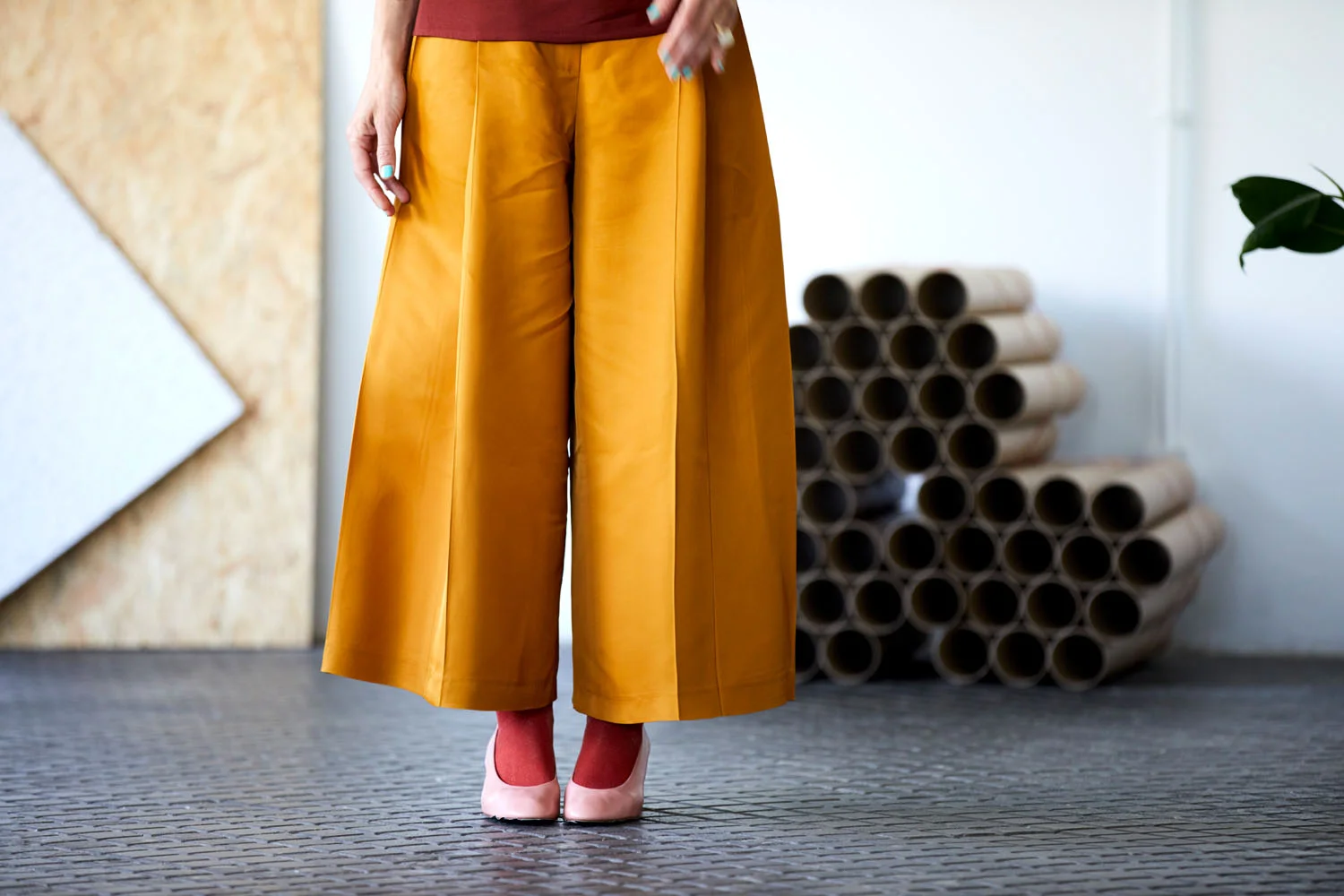 Midsection of creative businesswoman pants photo