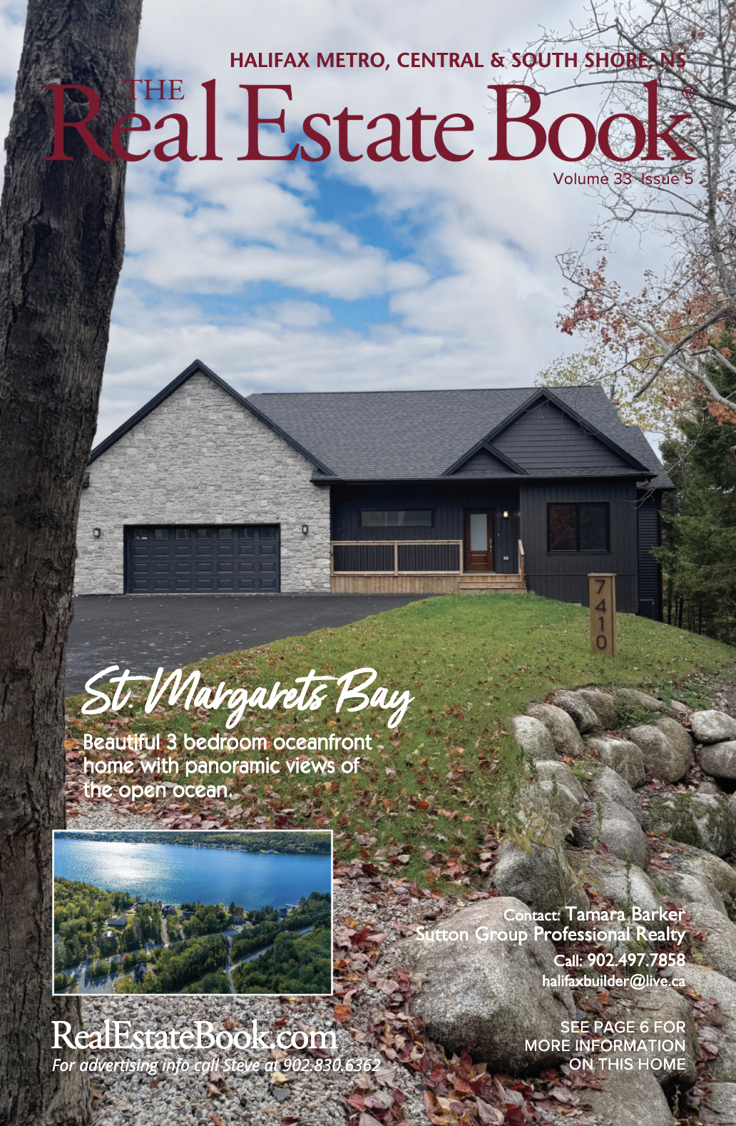 Front cover of a real estate magazine featuring a grey bungalow with a stone-front attached garage.