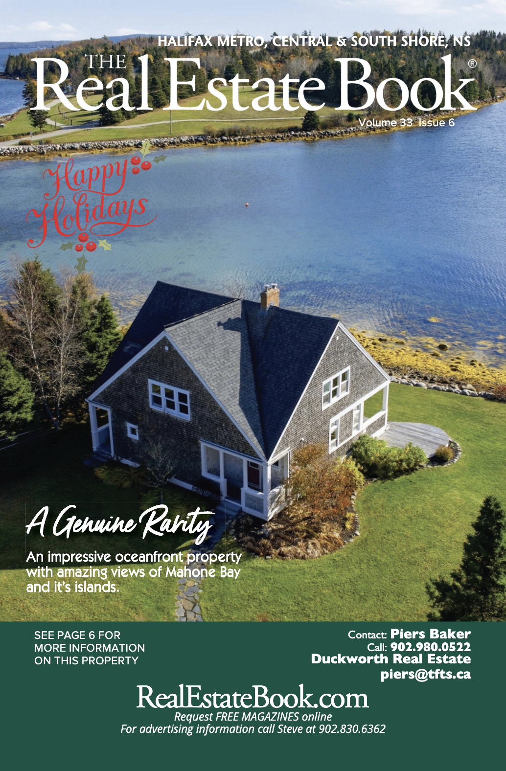 Front cover of a real estate magazine with an arial view of a grey home in front of the ocean.