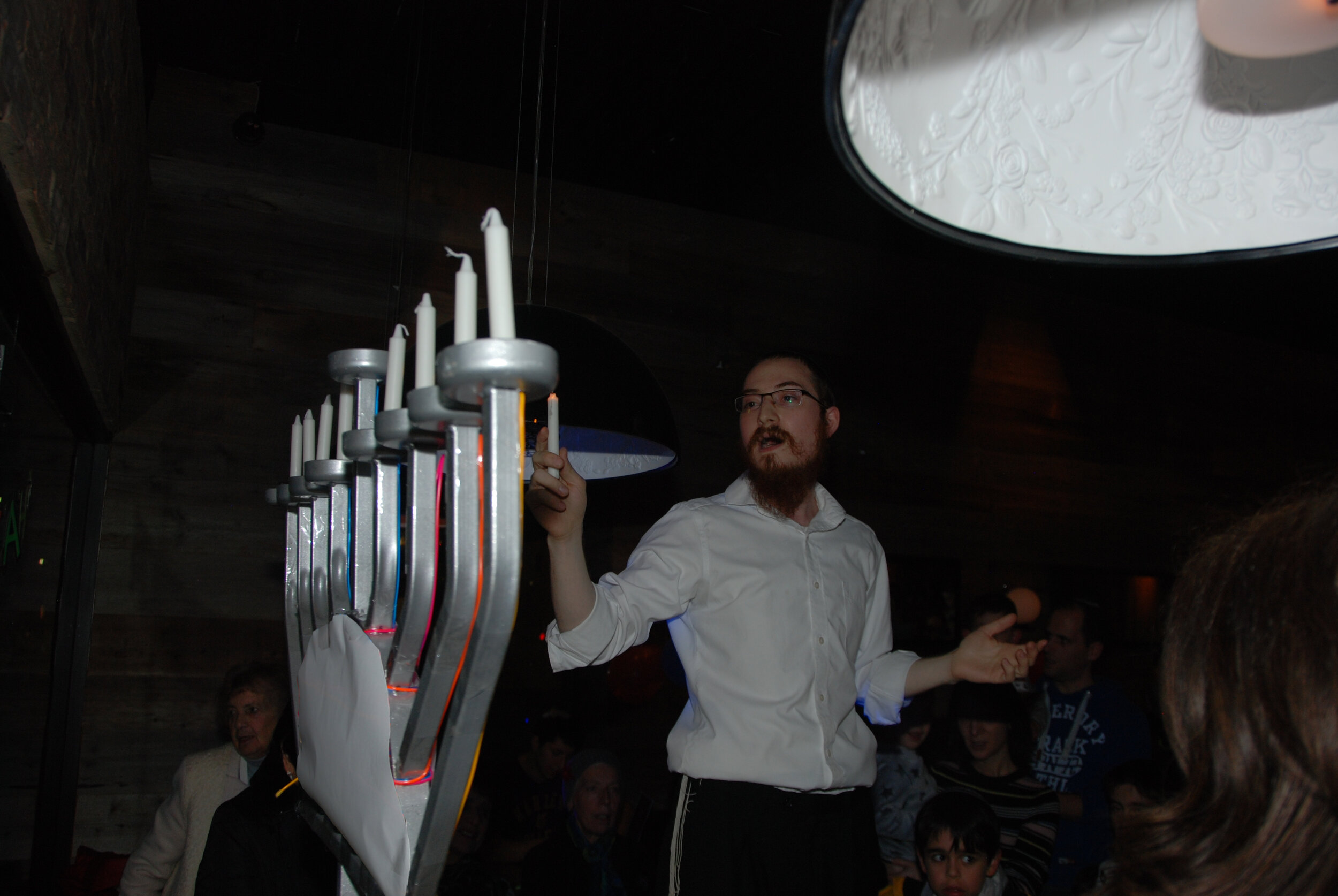 Rabbi Yosef Sharfstein From Bushey Chabad Gets Ready to Light the Menorah.jpg