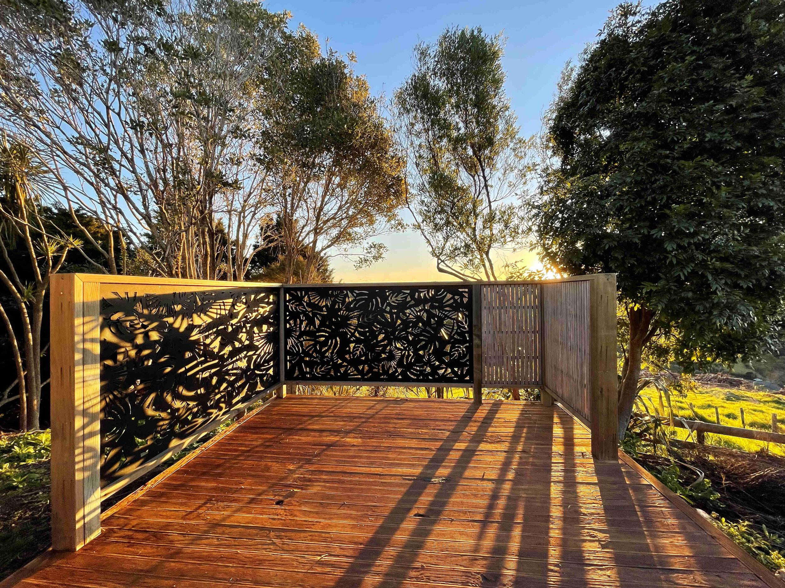 Bluewater Sanctuary_Tui CottageTutukaka_Sunset_Deck_Cottage_1.jpg