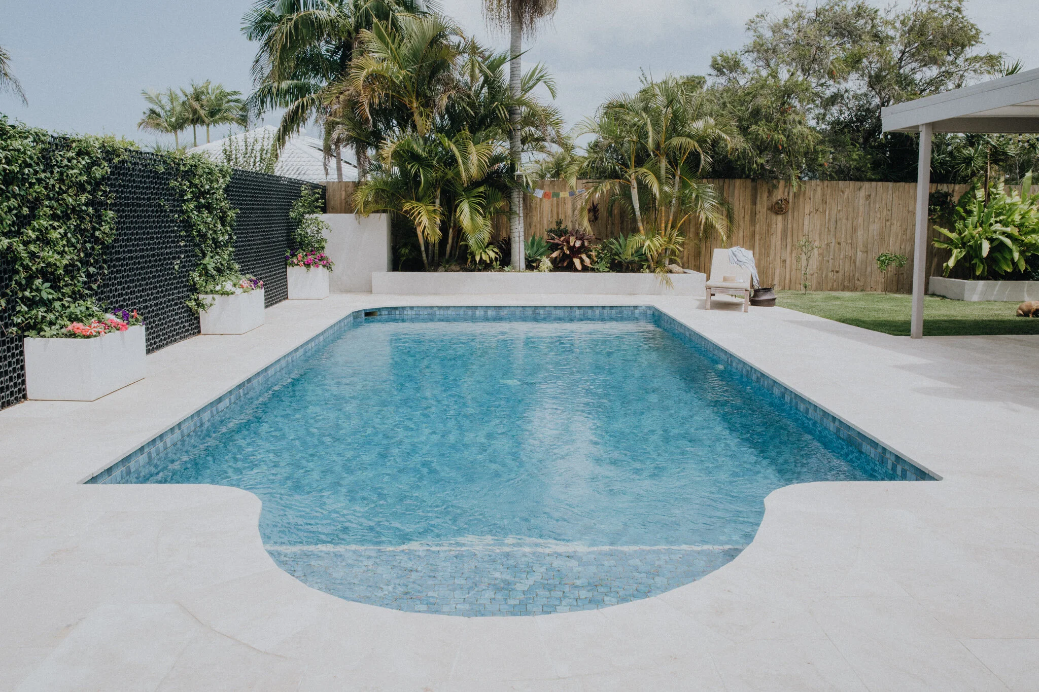 Stunning holiday rental pool on a beautiful sunny day, designed for guest comfort and an innovative holiday experience