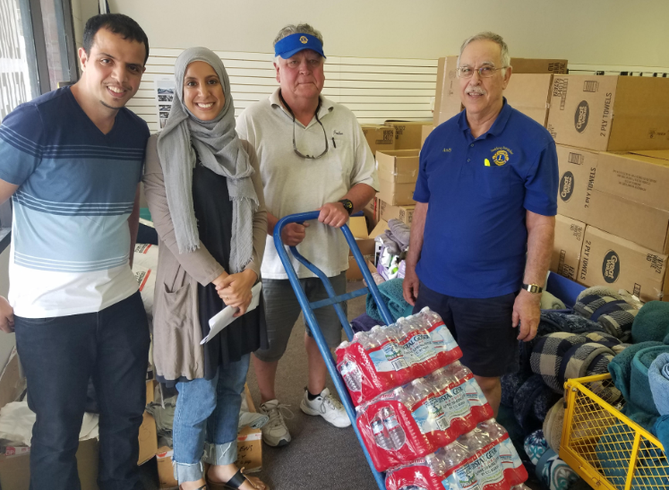 Lions working at relief center.png