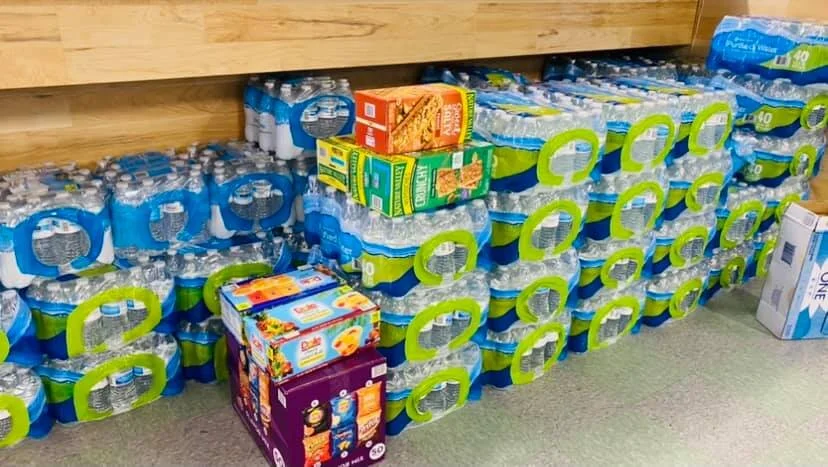 Placerville Lions Club donates 80 cases of water to the Upper Room Dining Hall