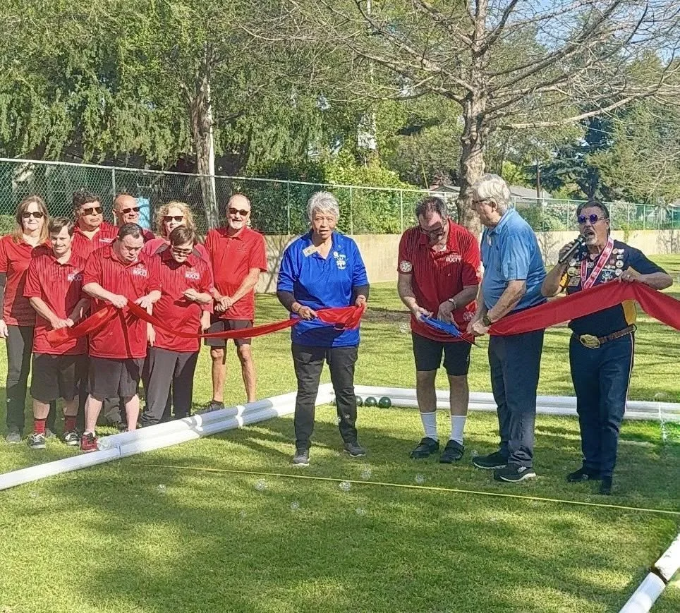 Ribbon cutting ceremony for bocce courts by Special Olympics Los Angeles Lions Club