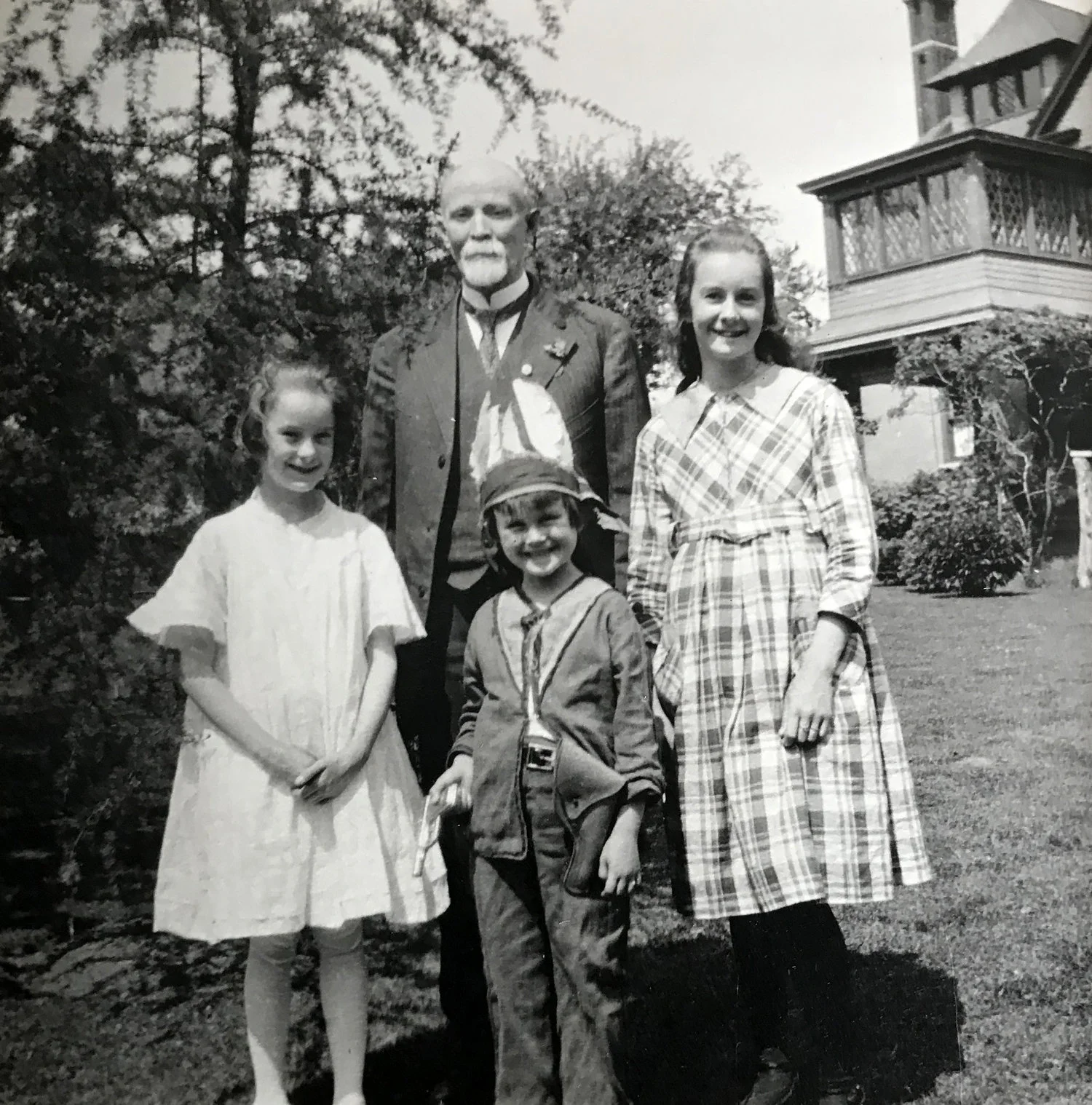 Jesse Marion Walker with his three granddaughters, to the west of the house.