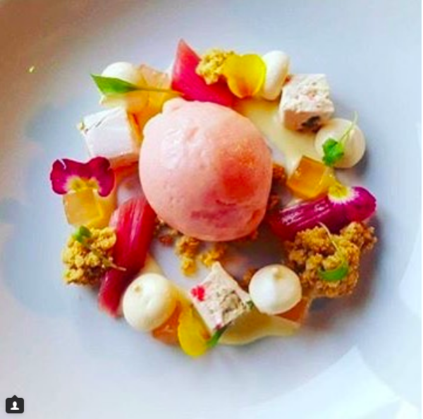 Chef Joseph Fallowfield’s Crazy Gin infused sorbet with rose and pistachio nougat, poached rhubarb, Crazy Gin and rhubarb jelly, meringue and orange blossom cream. (Instagram:@josephfallowfield)