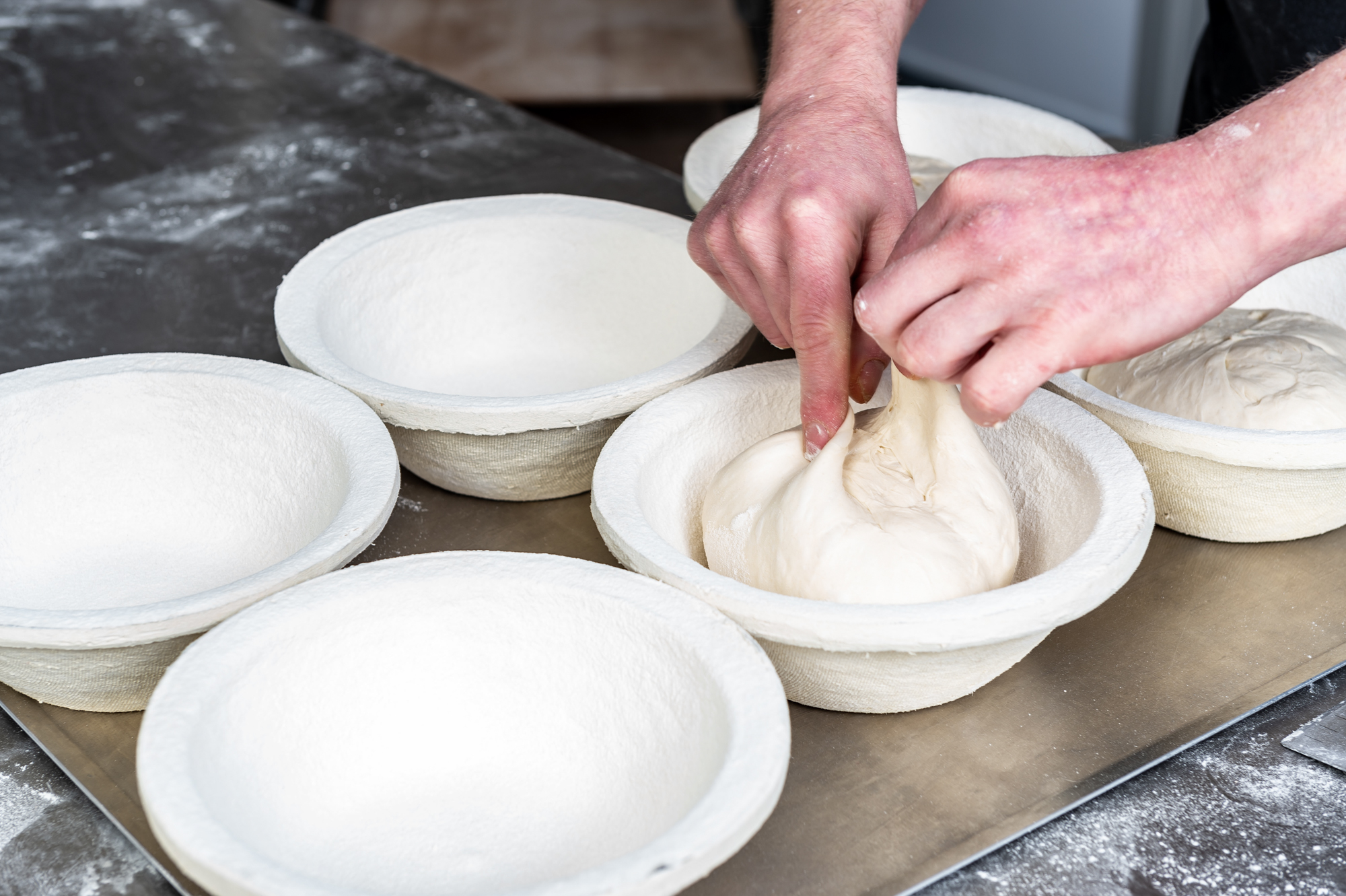 Placing the dough in the cases