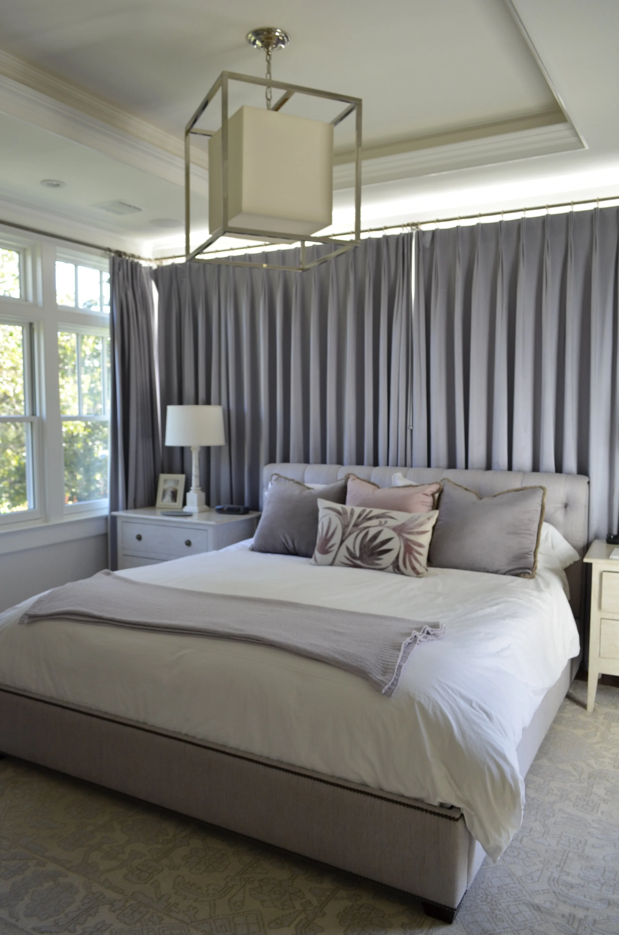  Master bedroom addition with wrap around glass and coiffure ceiling.   