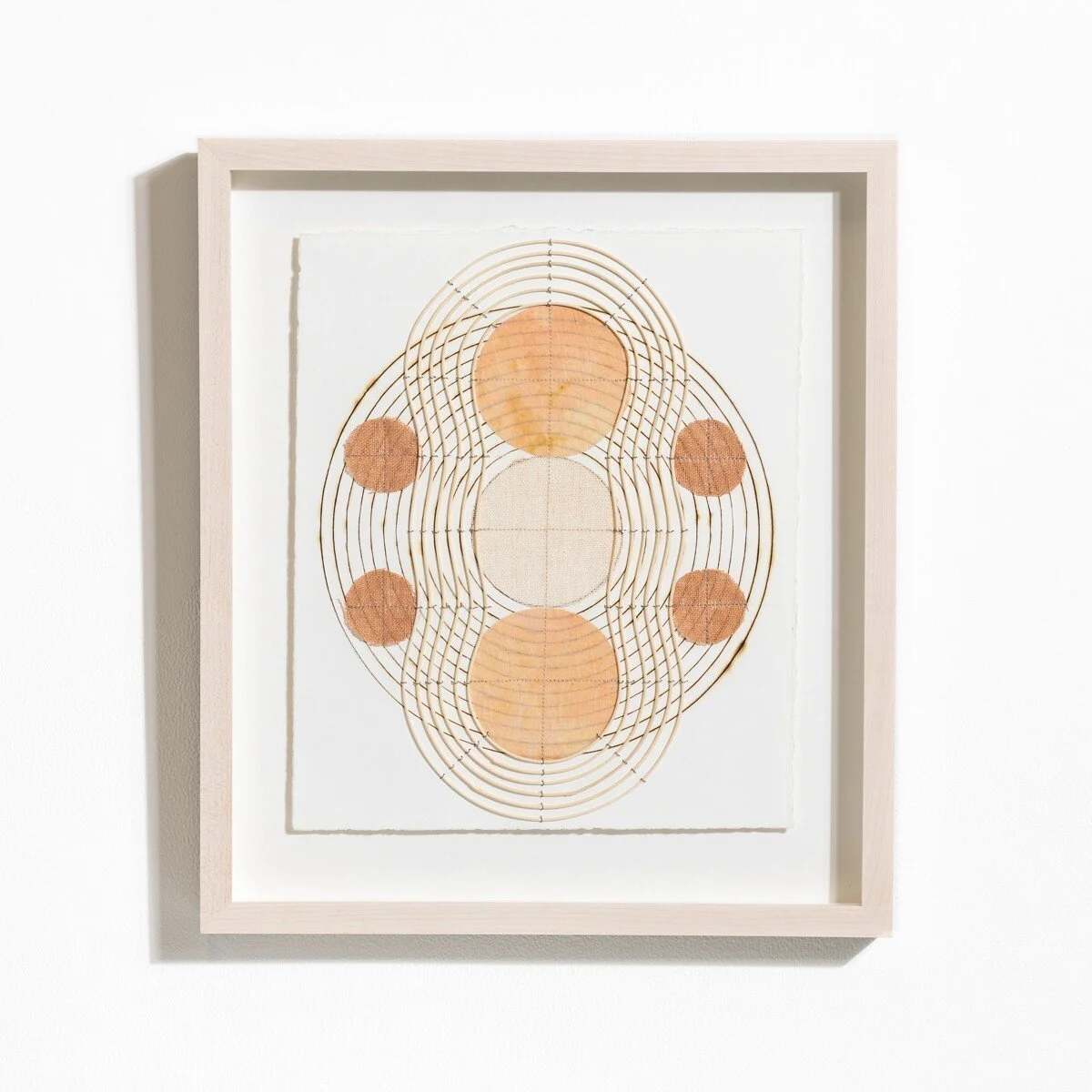 Contemporary, minimalist framed original artworks on paper with burned lines by Boston-based artist Katrine Hildebrandt-Hussey @ Soapbox Arts Gallery