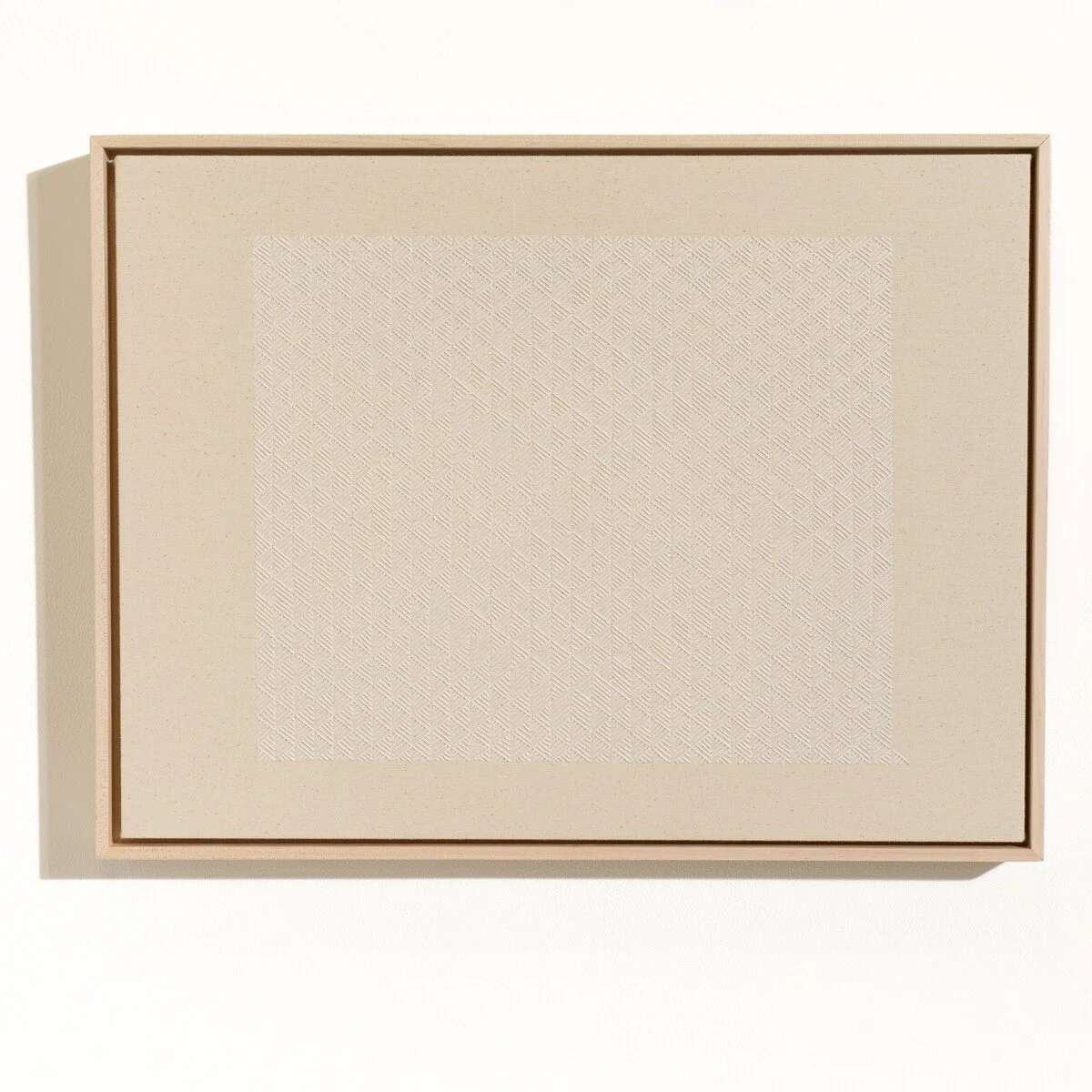 hand embroidered artwork with white thread on cotton canvas in geometric patterns by Alice Wiese for Soapbox Arts Gallery in Burlington, Vermont