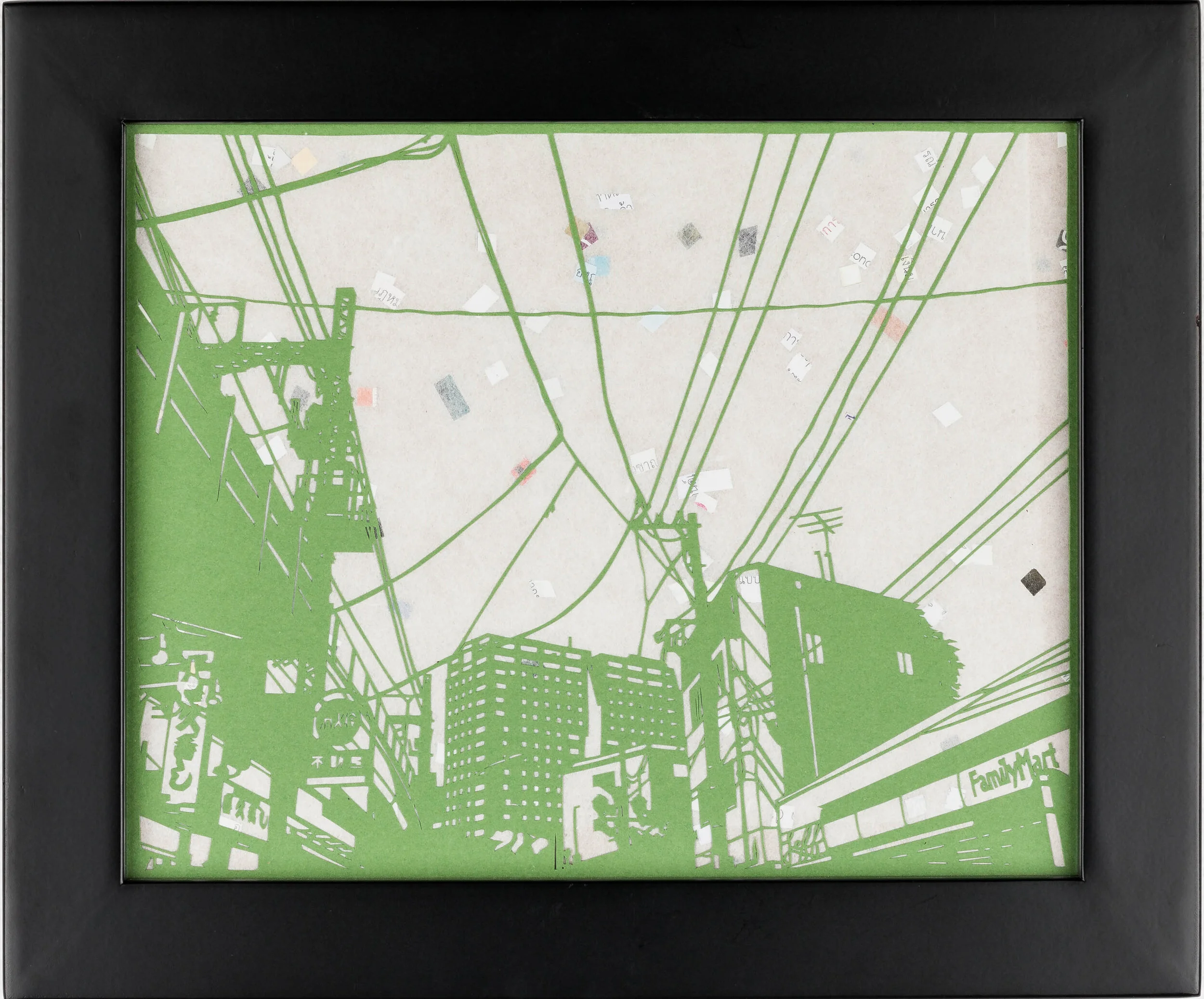 framed handcut paper artwork featuring urban scene of buildings and telephone wires by Rosa Leff 