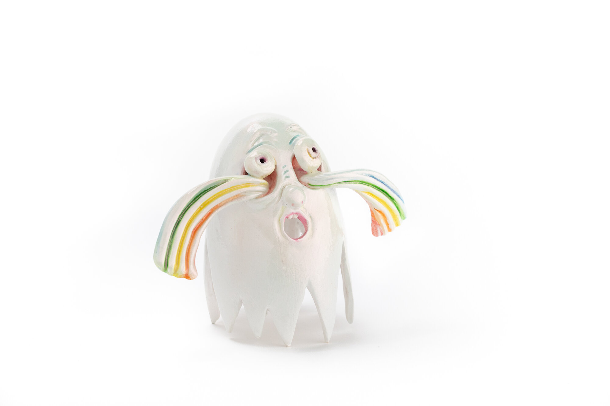 Painted ceramic sculpture of a ghost crying rainbow tears.