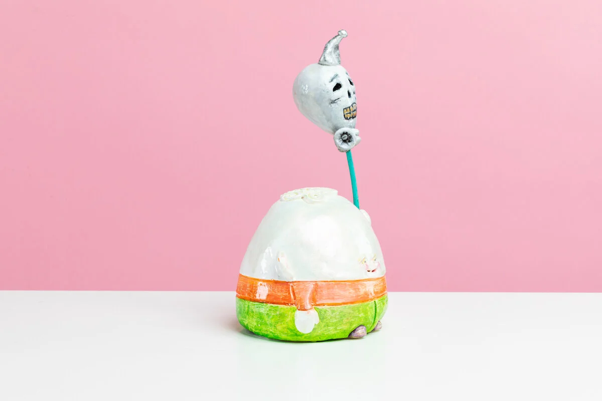 Surreal Humorous Original Hand-built Ceramic Sculpture of Evil Child with Balloon by Burlington-Based Ceramicist Jennifer McCandless