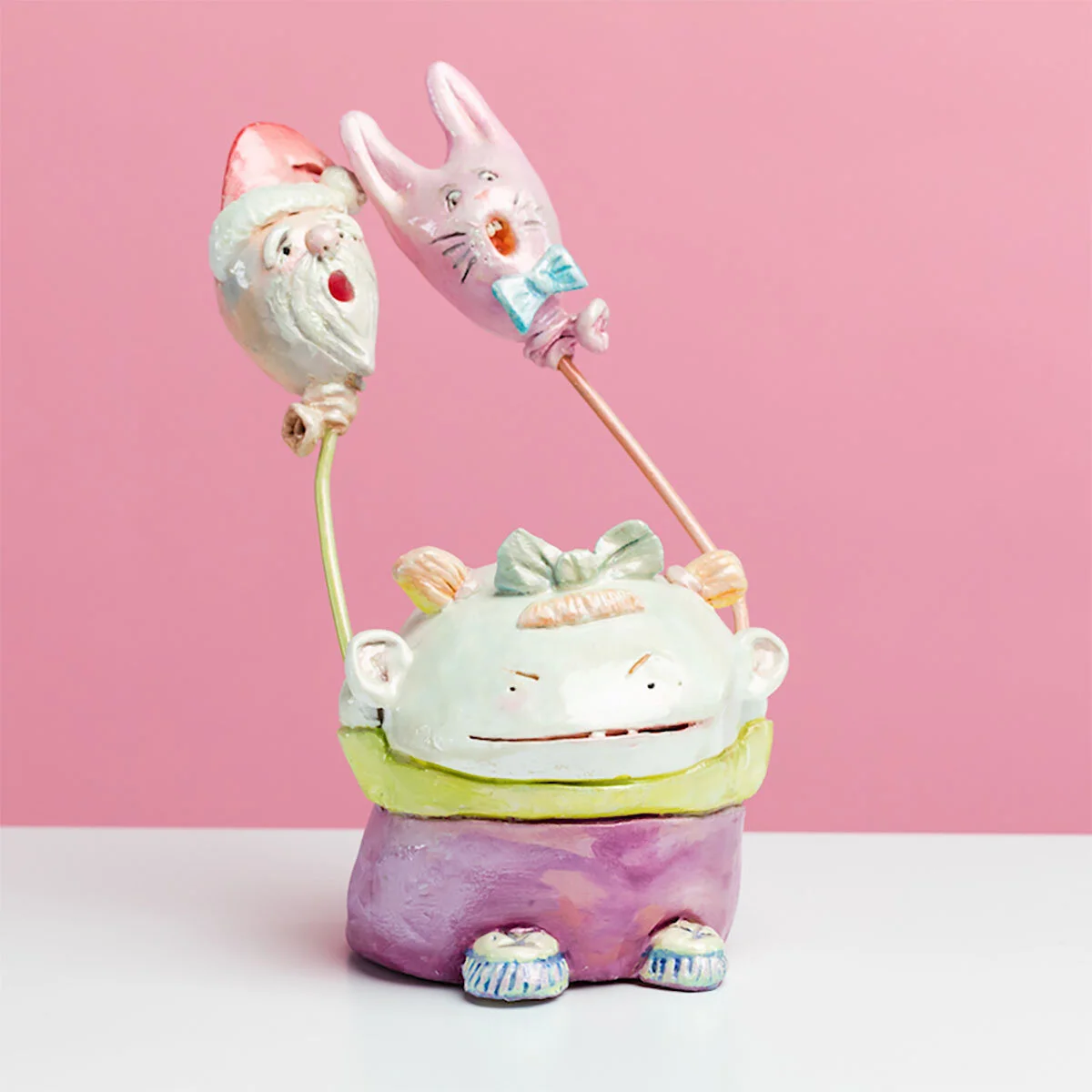 Surreal Humorous Original Hand-built Ceramic Sculpture of Evil Child with Balloon by Burlington-Based Ceramicist Jennifer McCandless