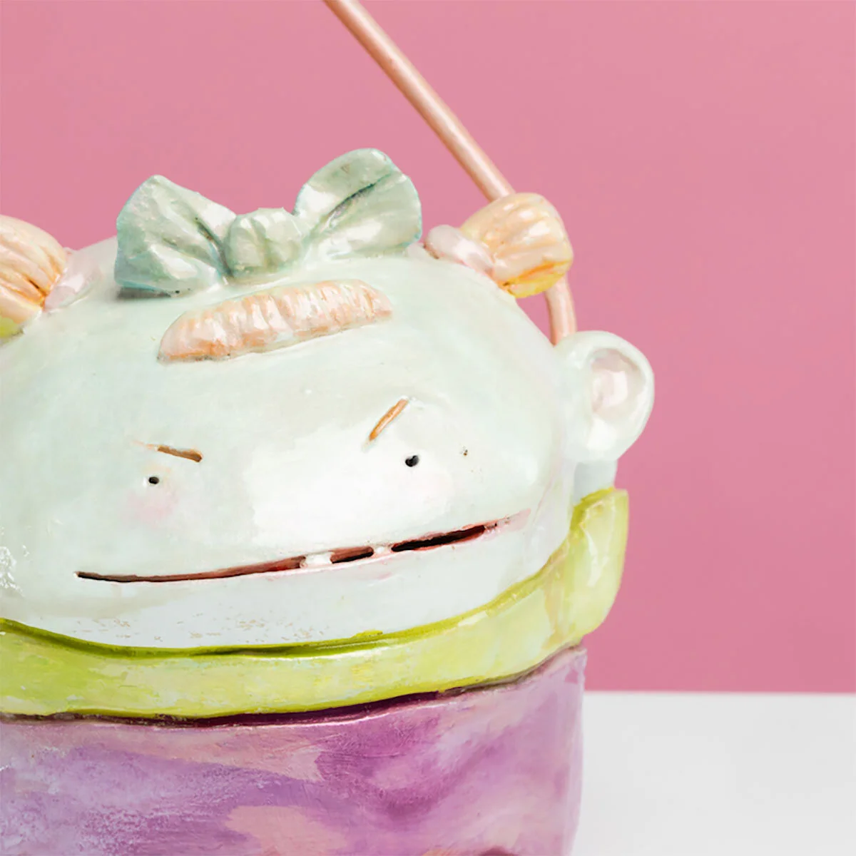 Surreal Humorous Original Hand-built Ceramic Sculpture of Evil Child with Balloon by Burlington-Based Ceramicist Jennifer McCandless