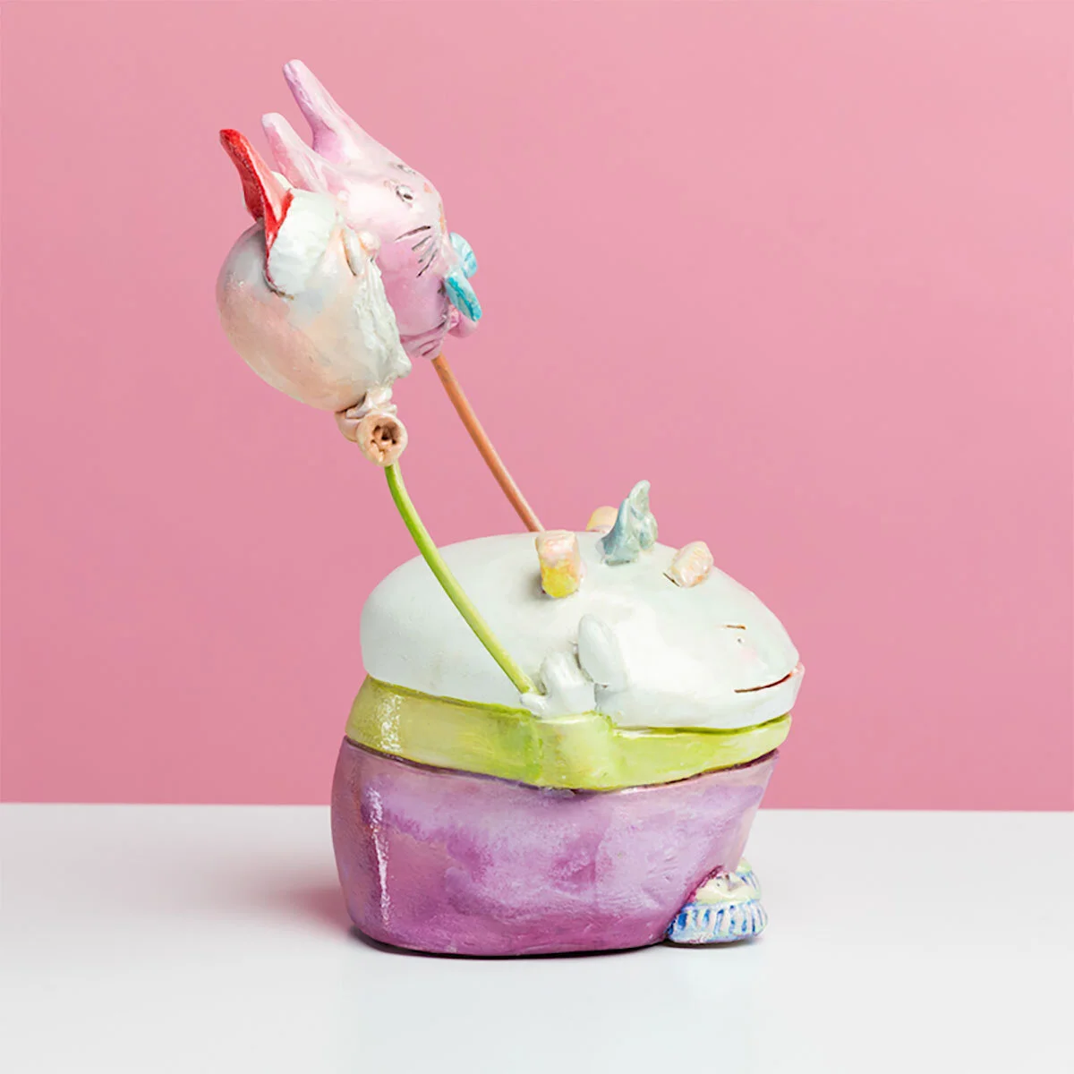 Surreal Humorous Original Hand-built Ceramic Sculpture of Evil Child with Balloon by Burlington-Based Ceramicist Jennifer McCandless