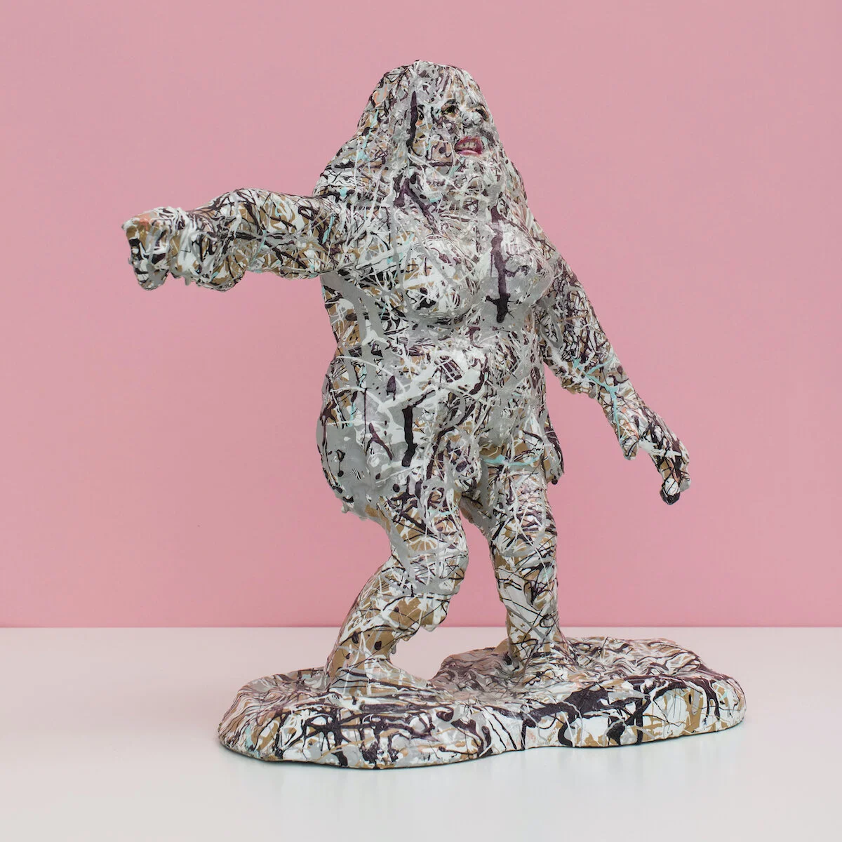 humorous hand built and painted ceramic sculpture of a female figure covered in Jackson Pollock-inspired splatter paint by Jennifer McCandless available through Soapbox Arts