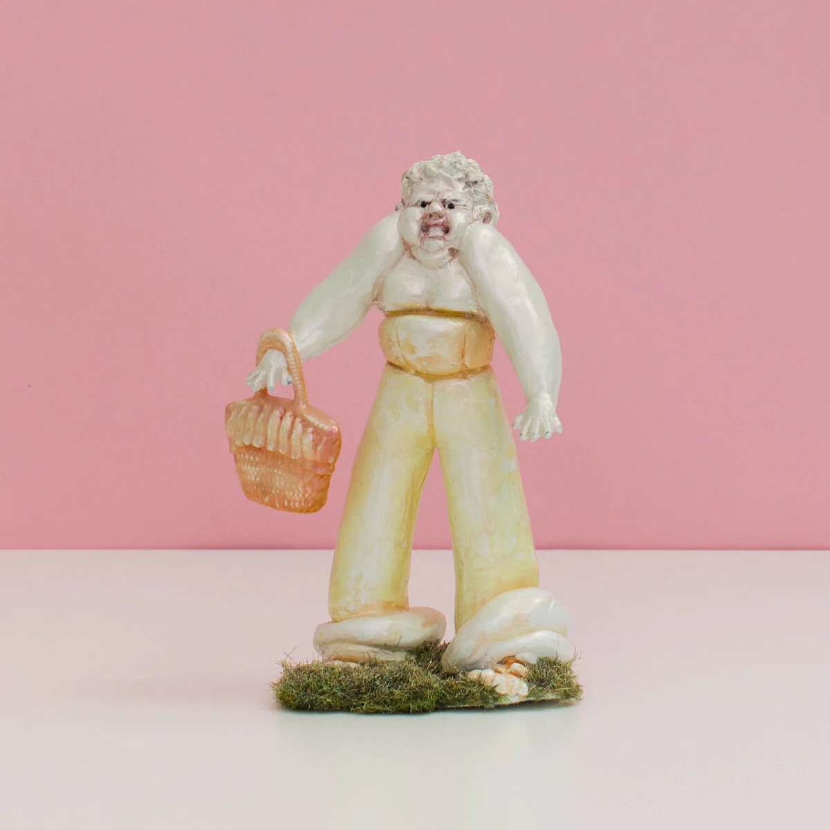 humorous hand built and painted ceramic sculptures of small women squeezing into tight fitting clothing in flailing positions by Jennifer McCandless available through Soapbox Arts