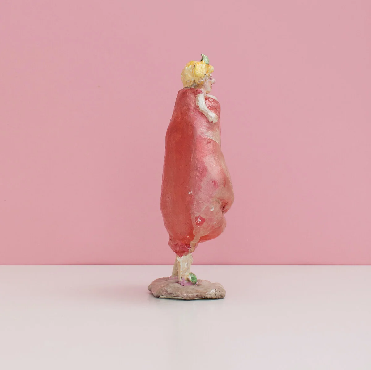 humorous hand built and painted ceramic sculpture of a female figure with a boxing glove creating her hips by Jennifer McCandless available through Soapbox Arts