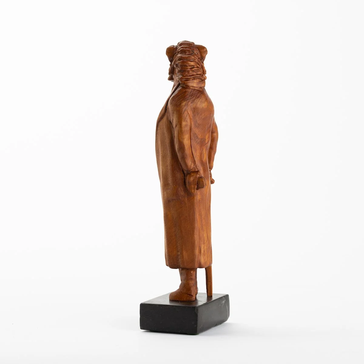 Original anthropomorphic wood sculpture on a stone base of a boar in jacket with a cane by Vermont artist and sculptor, Joe Lupiani, available @ Soapbox Arts Gallery in Vermont