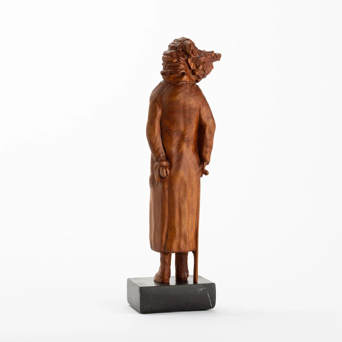 Original anthropomorphic wood sculpture on a stone base of a boar in jacket with a cane by Vermont artist and sculptor, Joe Lupiani, available @ Soapbox Arts Gallery in Vermont