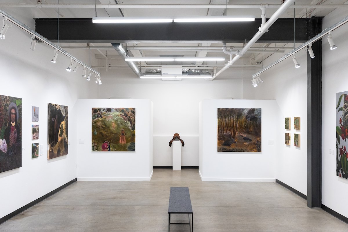 Exhibition Installation of 'Born by the River' featuring original oil paintings by Cuban artist, Orlando Almanza, at Soapbox Arts Gallery in Burlington, Vermont