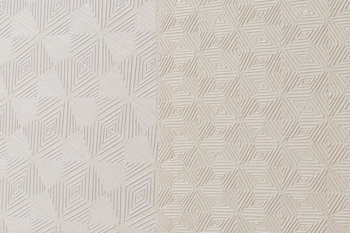 hand embroidered artwork with white thread on cotton canvas in geometric patterns by Alice Wiese for Soapbox Arts Gallery in Burlington, Vermont