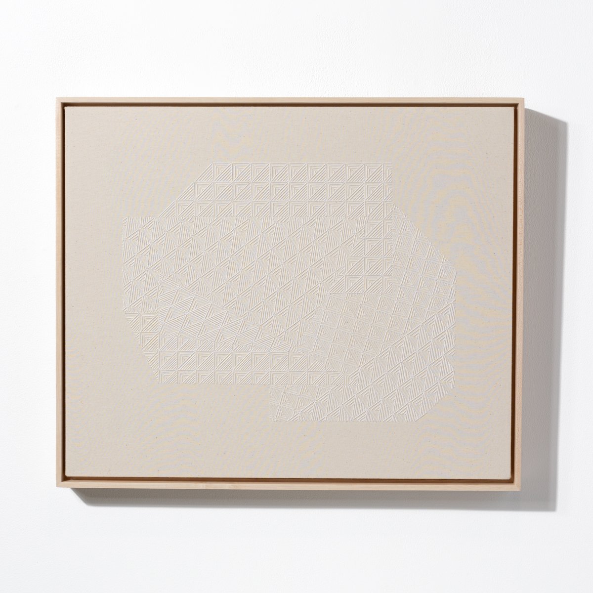 hand embroidered artwork with white thread on cotton canvas in geometric patterns by Alice Wiese for Soapbox Arts Gallery in Burlington, Vermont
