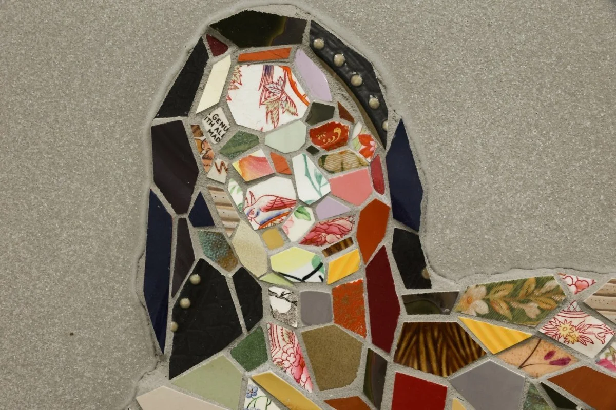Original Unique Figurative Portrait Mosaic of Woman made from broken dishes and cement by Mary Lacy for Soapbox Arts Gallery in Burlington, VT