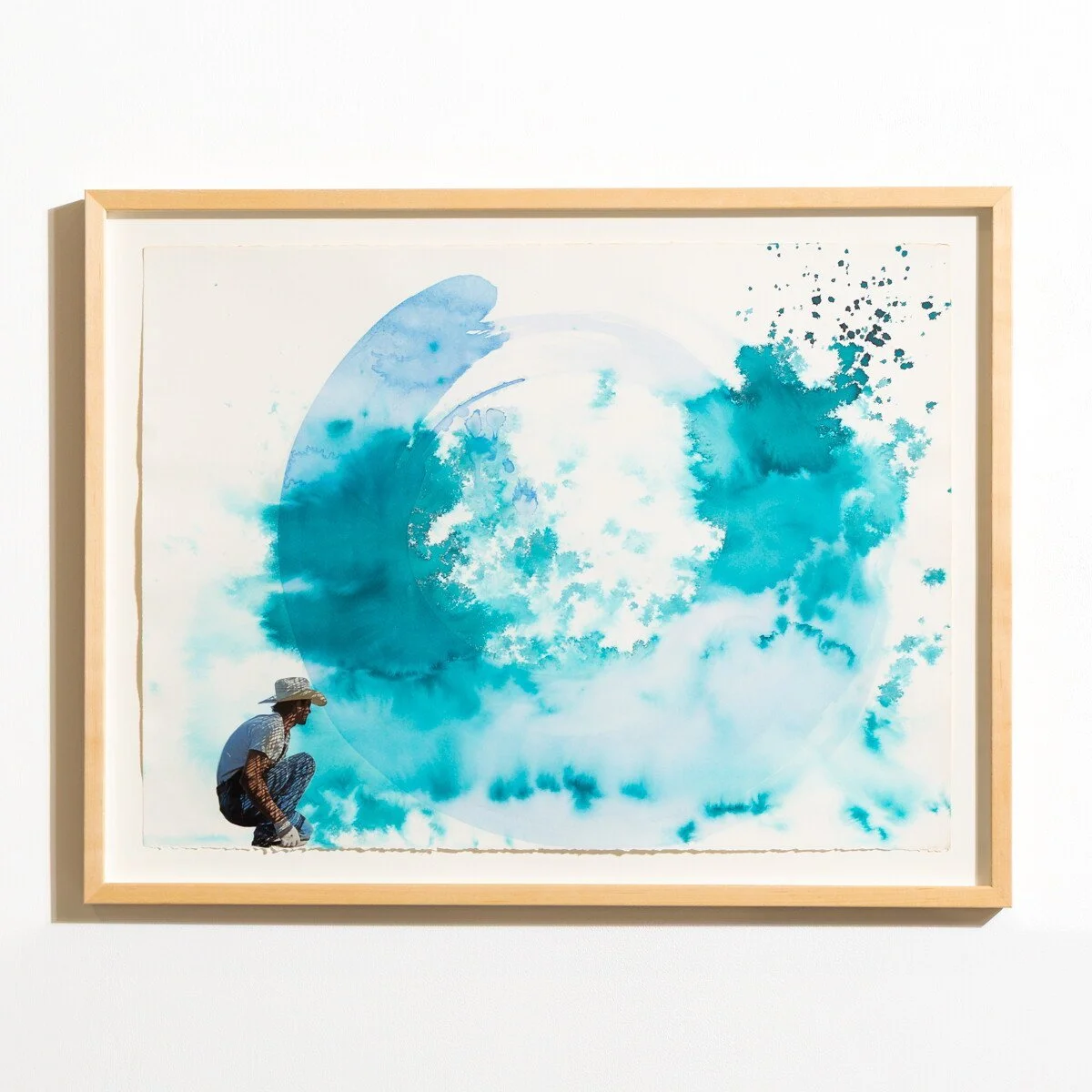 Original mixed media collage by Burlington-based artist, Vanessa Compton, of one cowboy figure with abstract watercolor shapes available at Soapbox Arts Gallery in Burlington, VT
