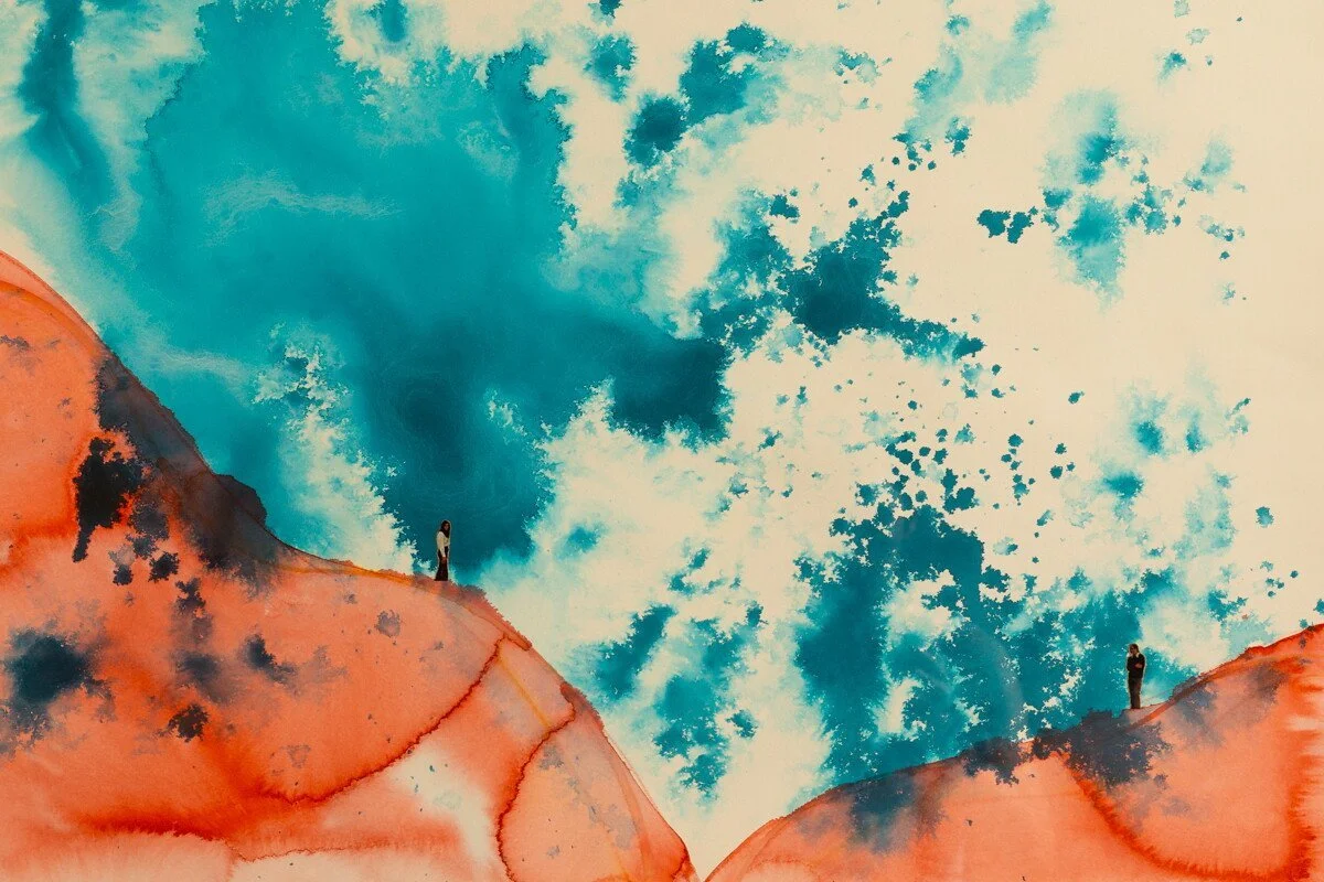Original mixed media collage by Burlington-based artist, Vanessa Compton, of two figures on abstract watercolor hills available at Soapbox Arts Gallery in Burlington, VT
