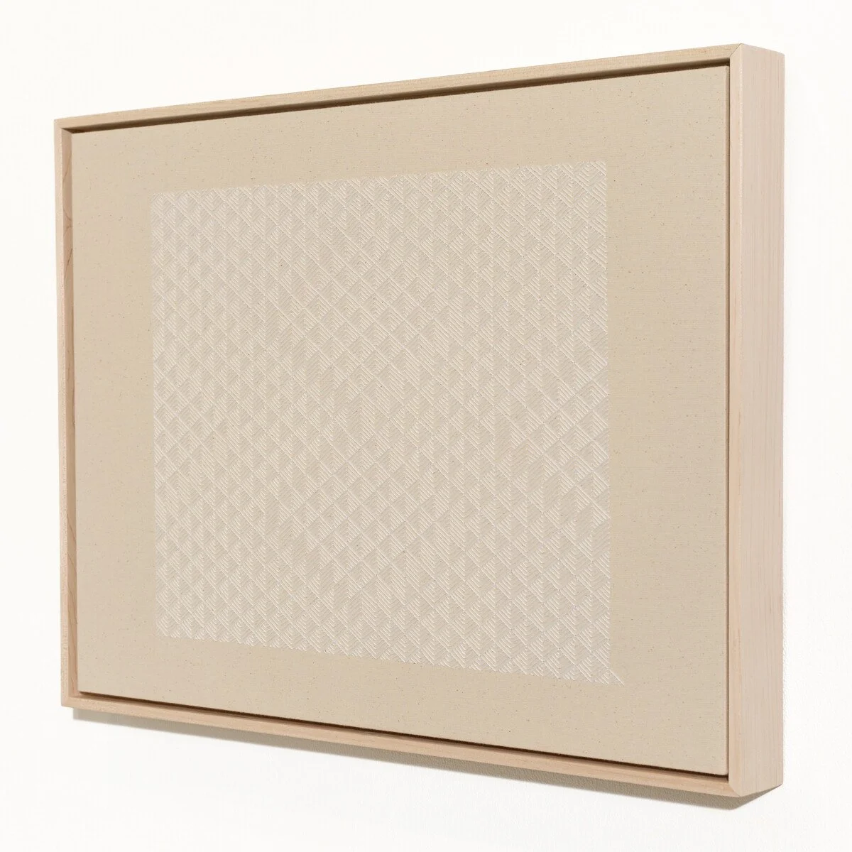 hand embroidered artwork with white thread on cotton canvas in geometric patterns by Alice Wiese for Soapbox Arts Gallery in Burlington, Vermont