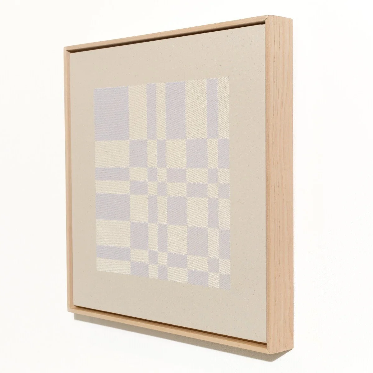 hand embroidered artwork with white thread on cotton canvas in geometric patterns by Alice Wiese for Soapbox Arts Gallery in Burlington, Vermont