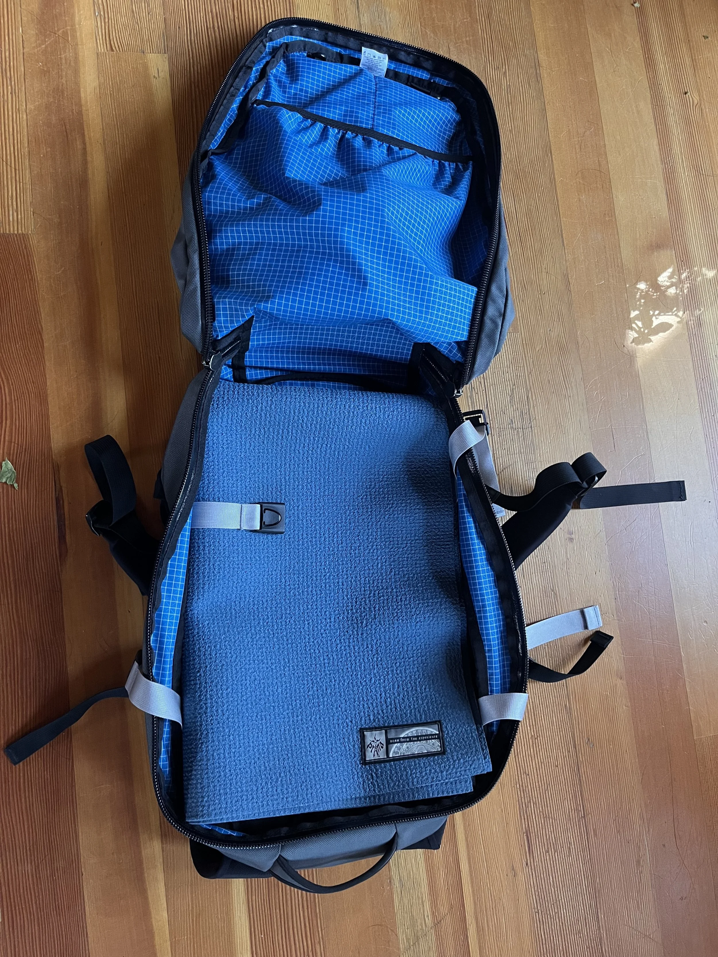 blue lightweight travel backpack for yoga retreats