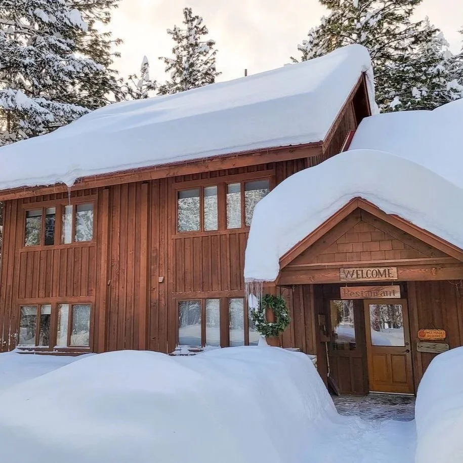 cabin covered in snow in methow valley yoga retreat