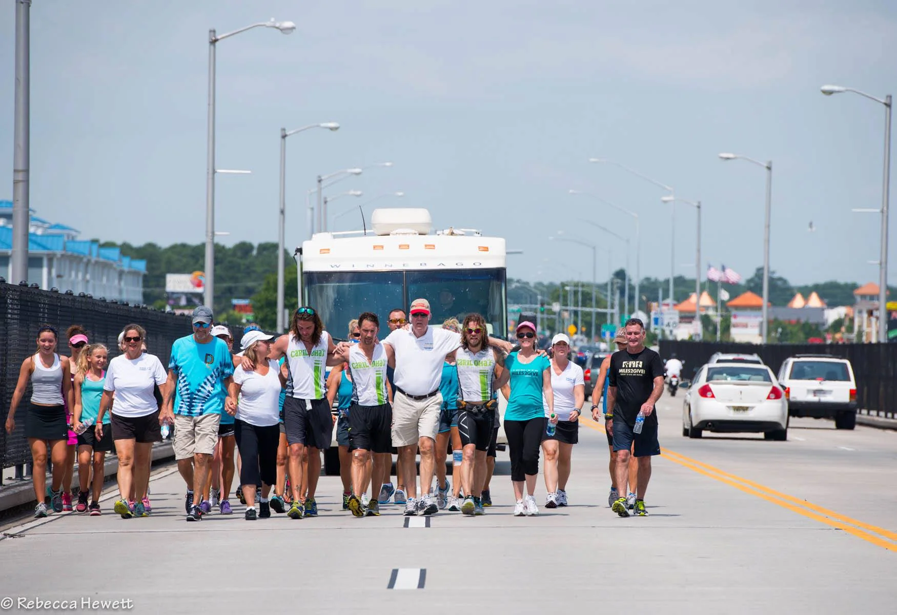 Landon, his two running partners and several guests take the final steps to Ocean City, Maryland after 157 days running across the USA. Two “Key To The City” awards were awarded for successfully completing their mission, and their efforts inspired thousands around the world. July 20, 2013