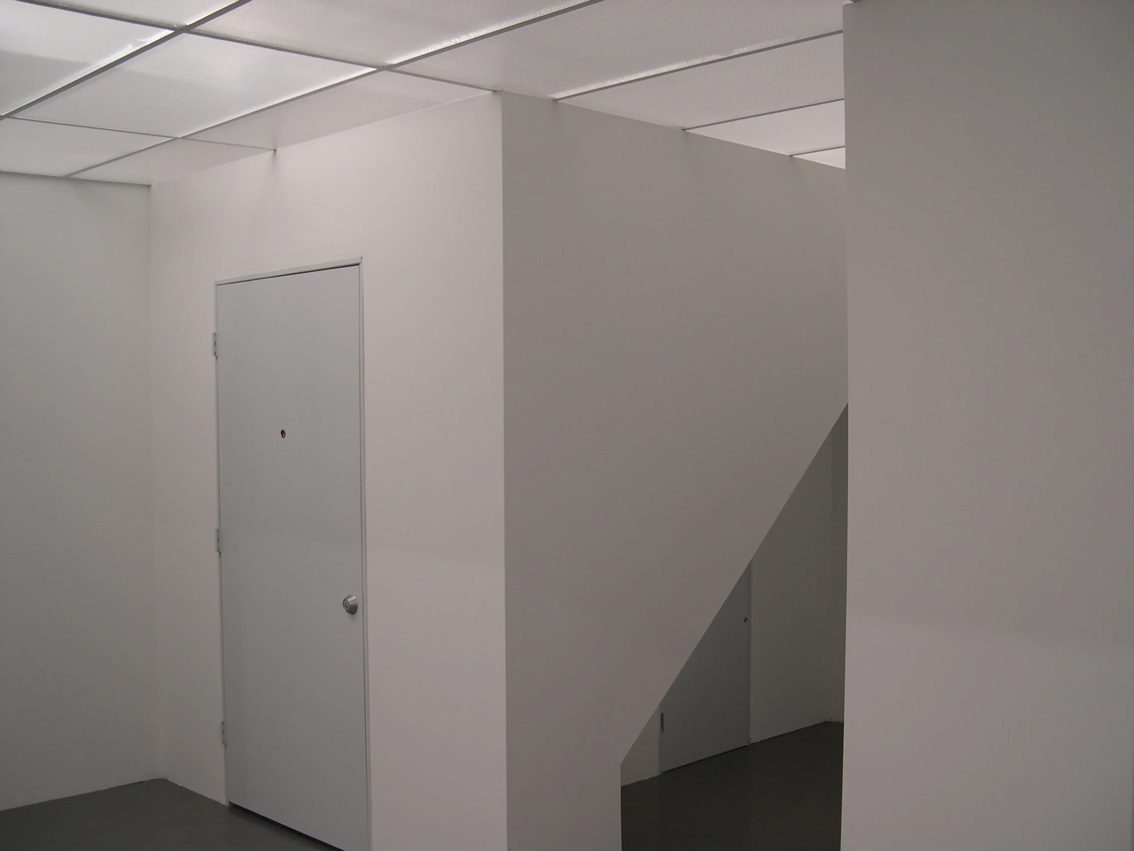   The Palace at 4 AM,  exterior view of room containing  Attic , as well as view of crawlspace under the steps. 