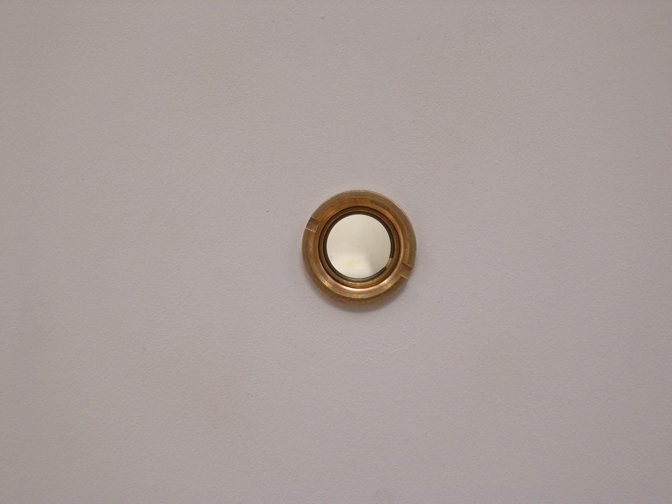   The Palace at 4 AM , installation view of door peephole 