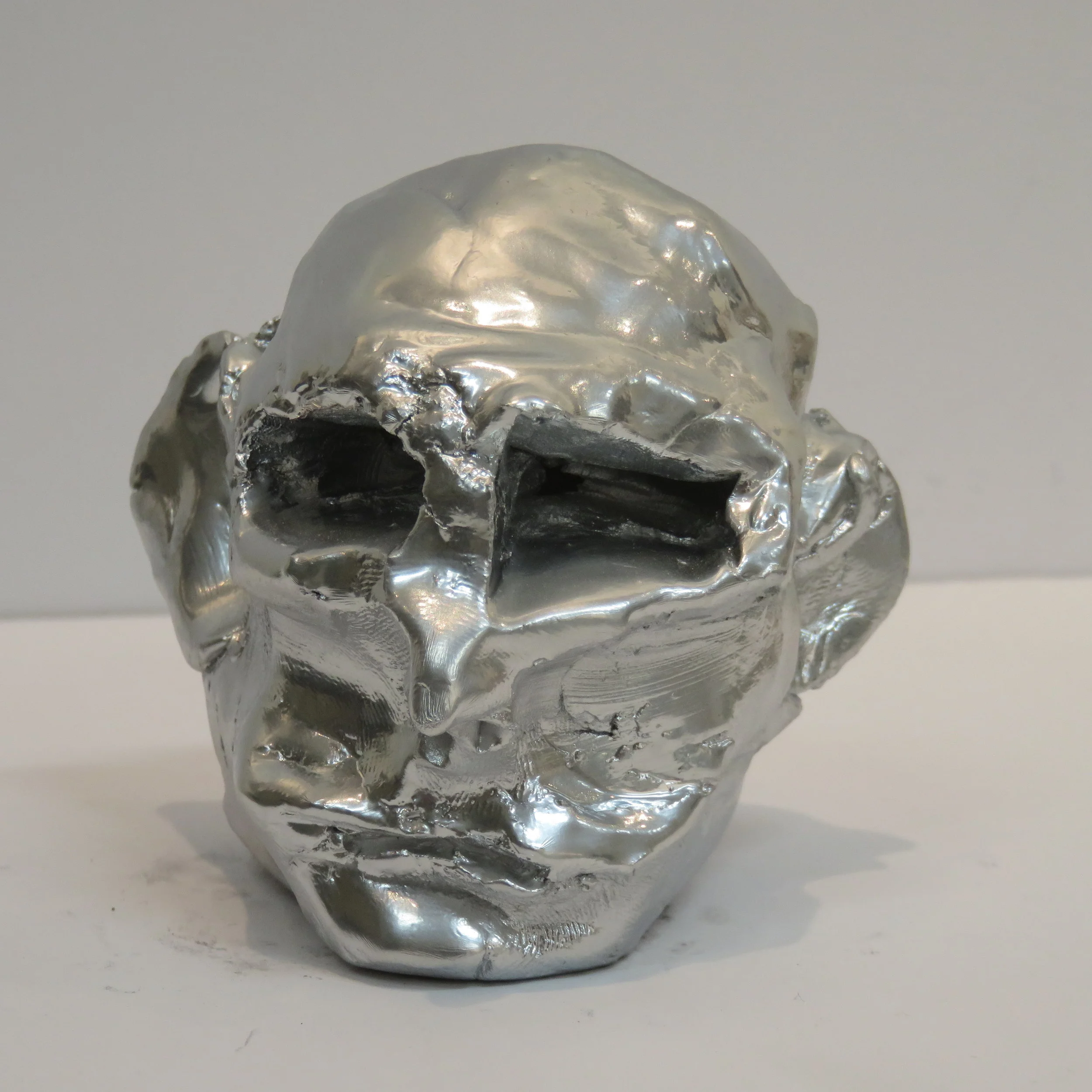    Future Object (Head),    enamel on high fired porcelain, 2 ½  x 3 x 3 inches, 2014 