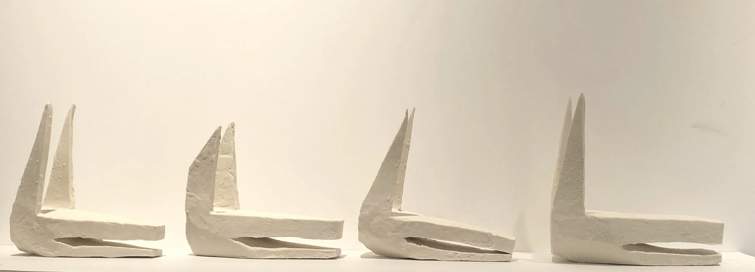    Jackals  , porcelain, each unit approx. 6 x 6 x 3 inches, 2020 