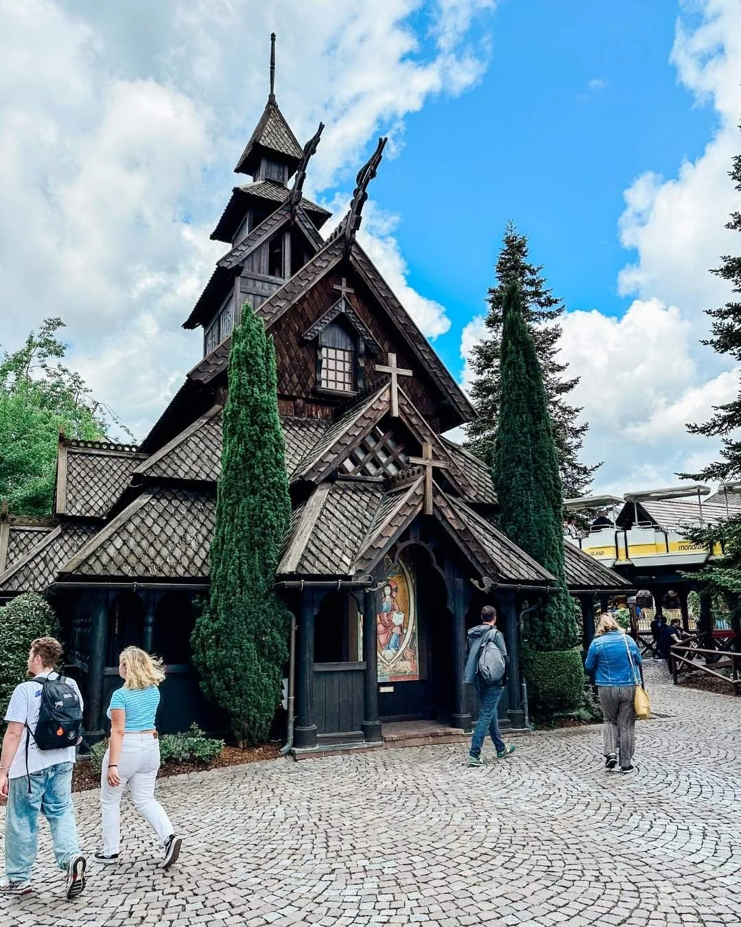 Dark wooden replica of a Norwegian church in Europa Park, Germany