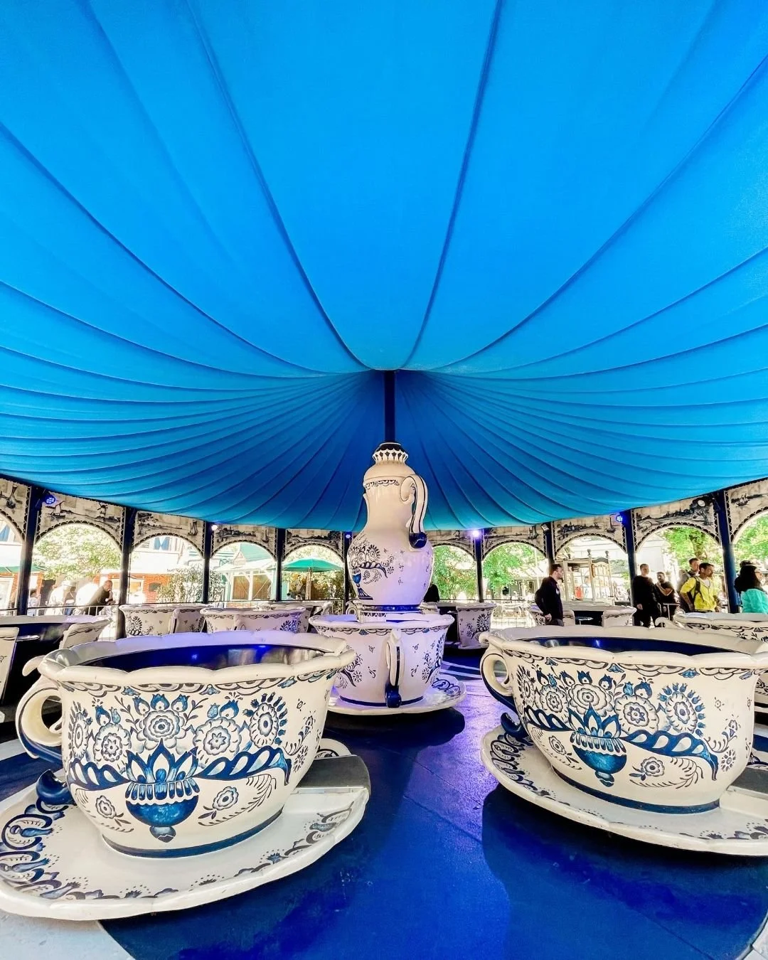 Blue and white teacup ride at Europa Park theme park in Germany.