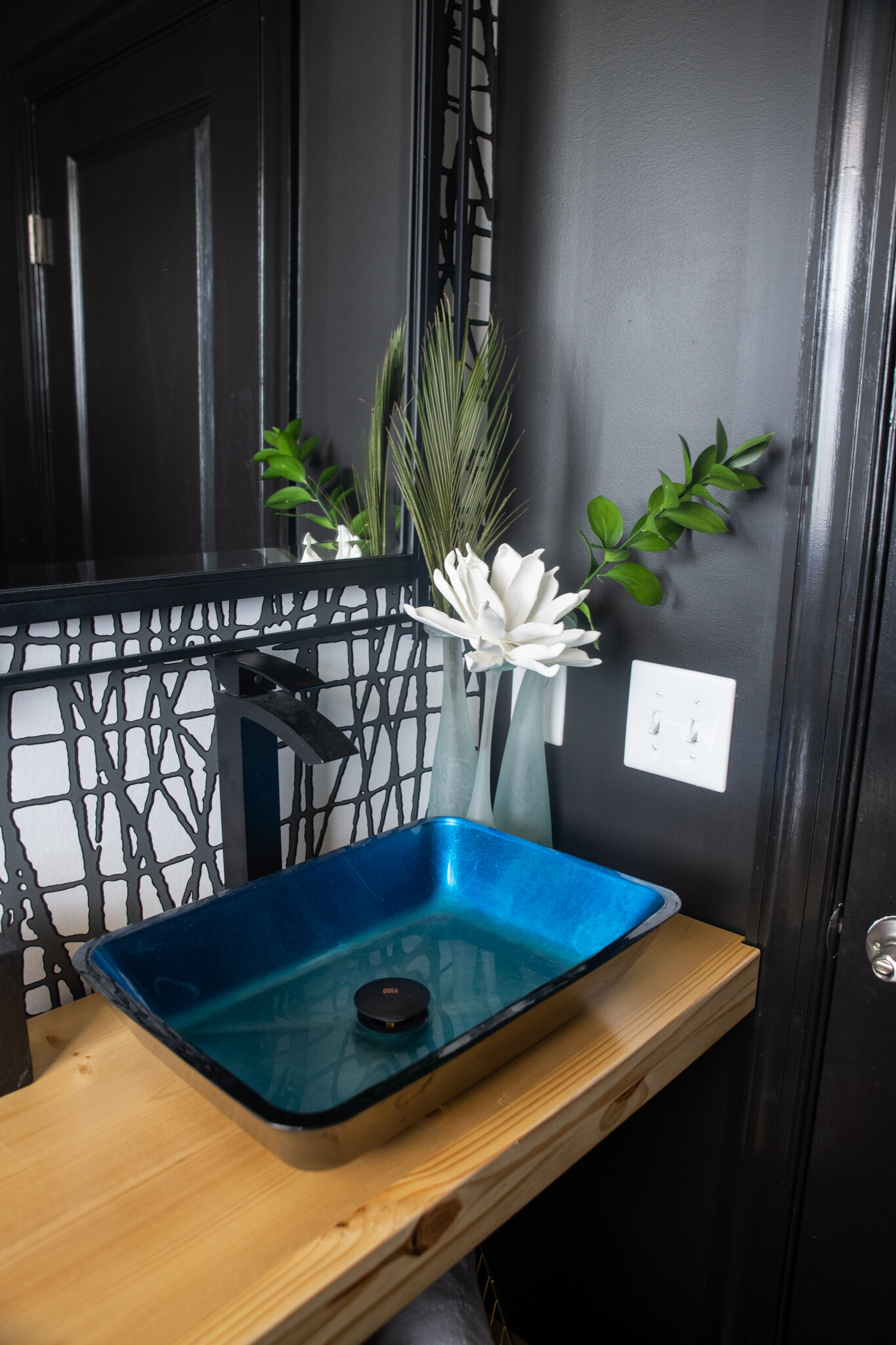 Dwell-Chic-Cool-Transitional-Home-Powder-Room-Vanity-Sink-Detail.jpg