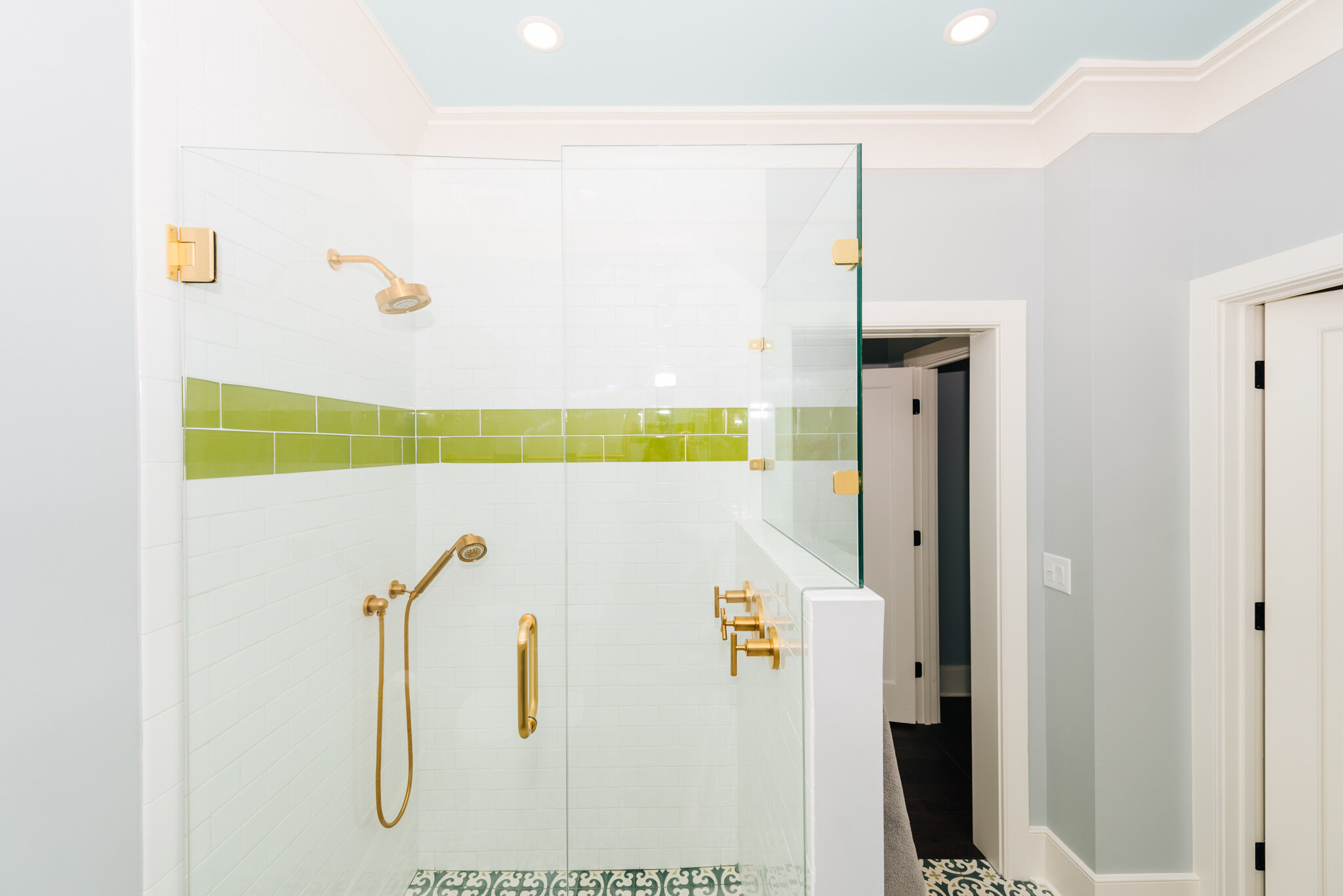 Dwell-Chic-Bright-Coastal-Home-White-And-Green-Shower-Details.jpg