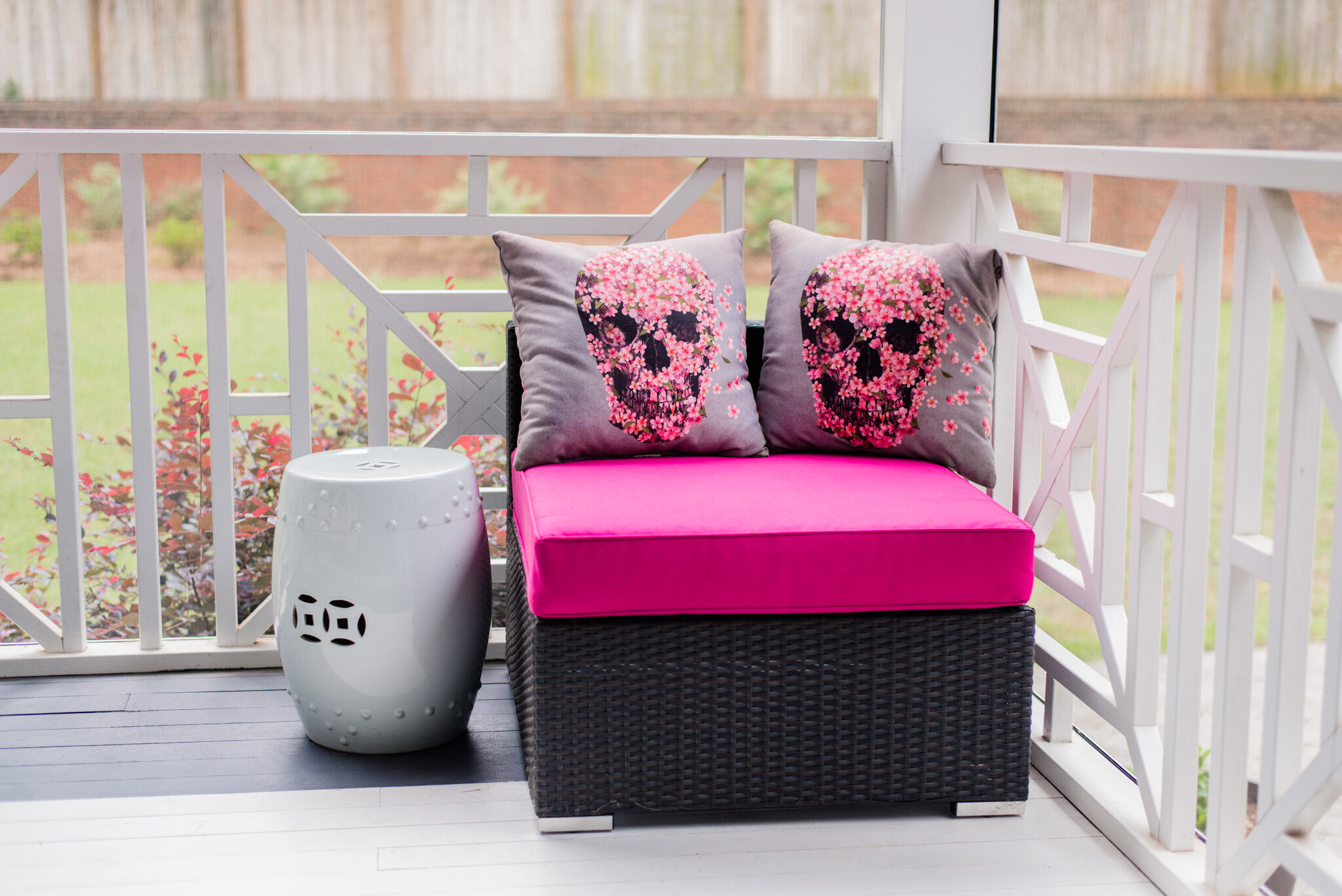Dwell-Chic-Contemporary-Vibrant-Outdoor-Porch-Skull-Pillows-Seat.jpg