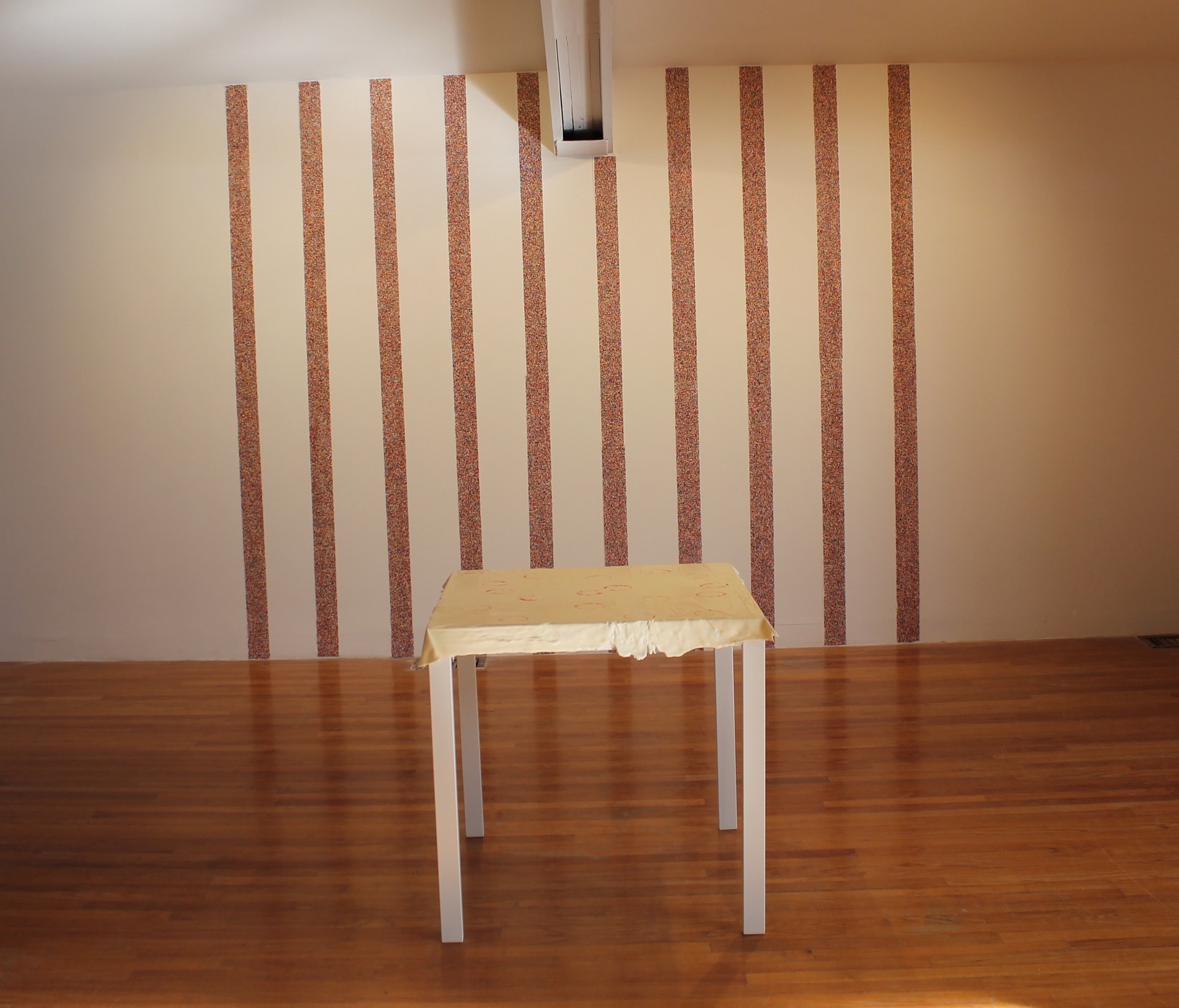 White Chocolate Table Cloth with WIne Stains by Paige Morris and Candy Wallpaper by Emma Salamon