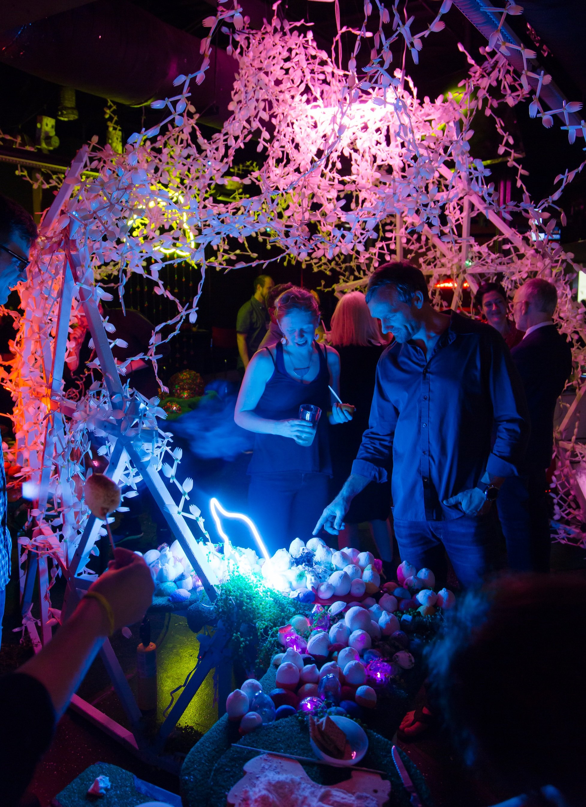Jessica Jane Julius and Erica Rosenfeld installation for Around the Campfire at the Studio at the Chrysler Museum of Art. Neon, blown glass, marshmallow, sporks, and mixed media.